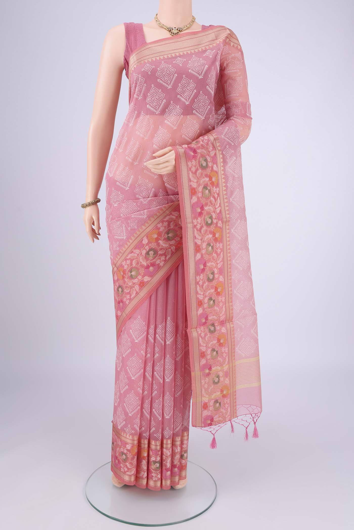 Pink Blended Kota Cotton Saree with Embroidery on the body and Thread Border.  displayed on a mannequin