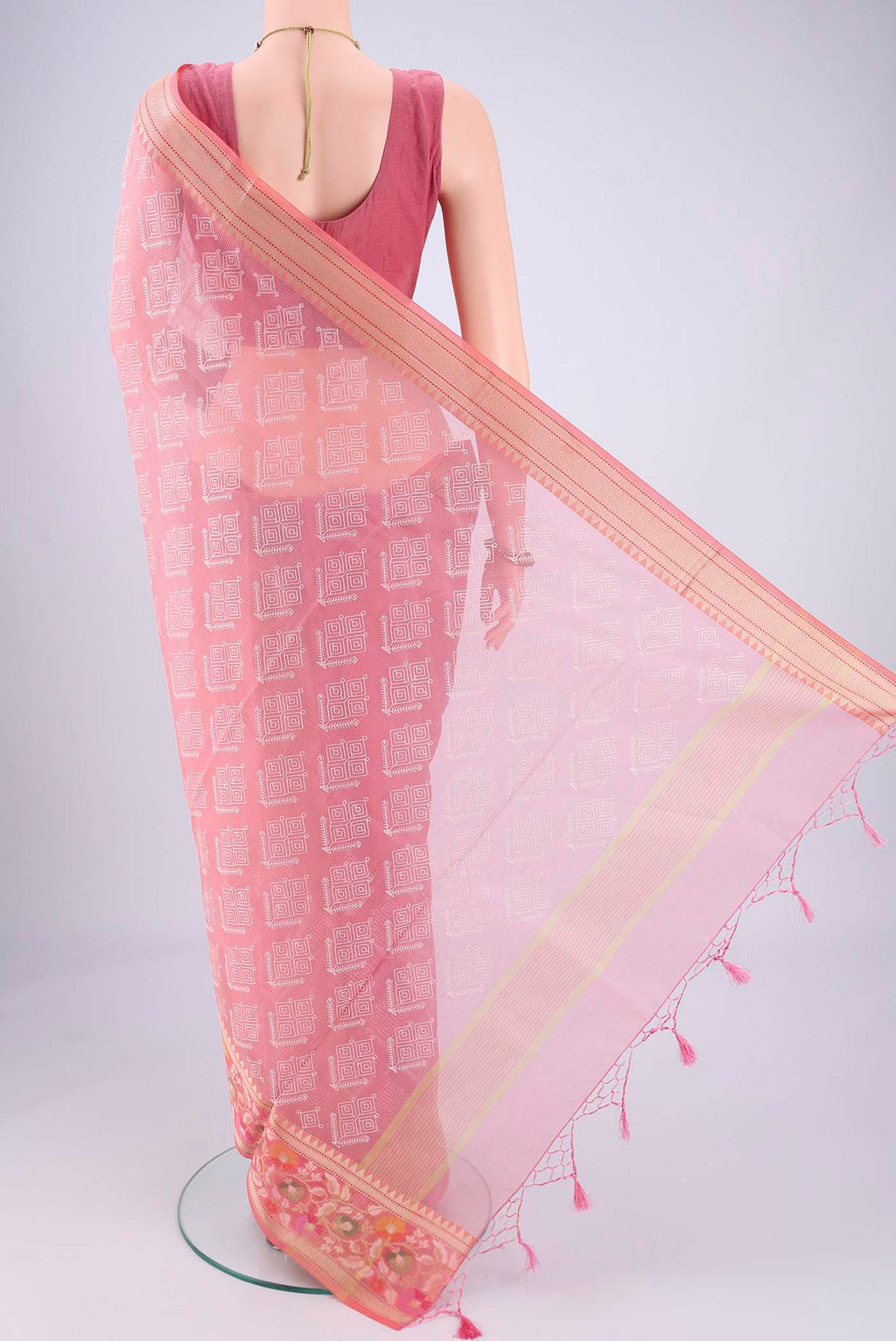 Flat view of Pink Blended Kota Cotton Saree with Embroidery on the body and Thread Border. 