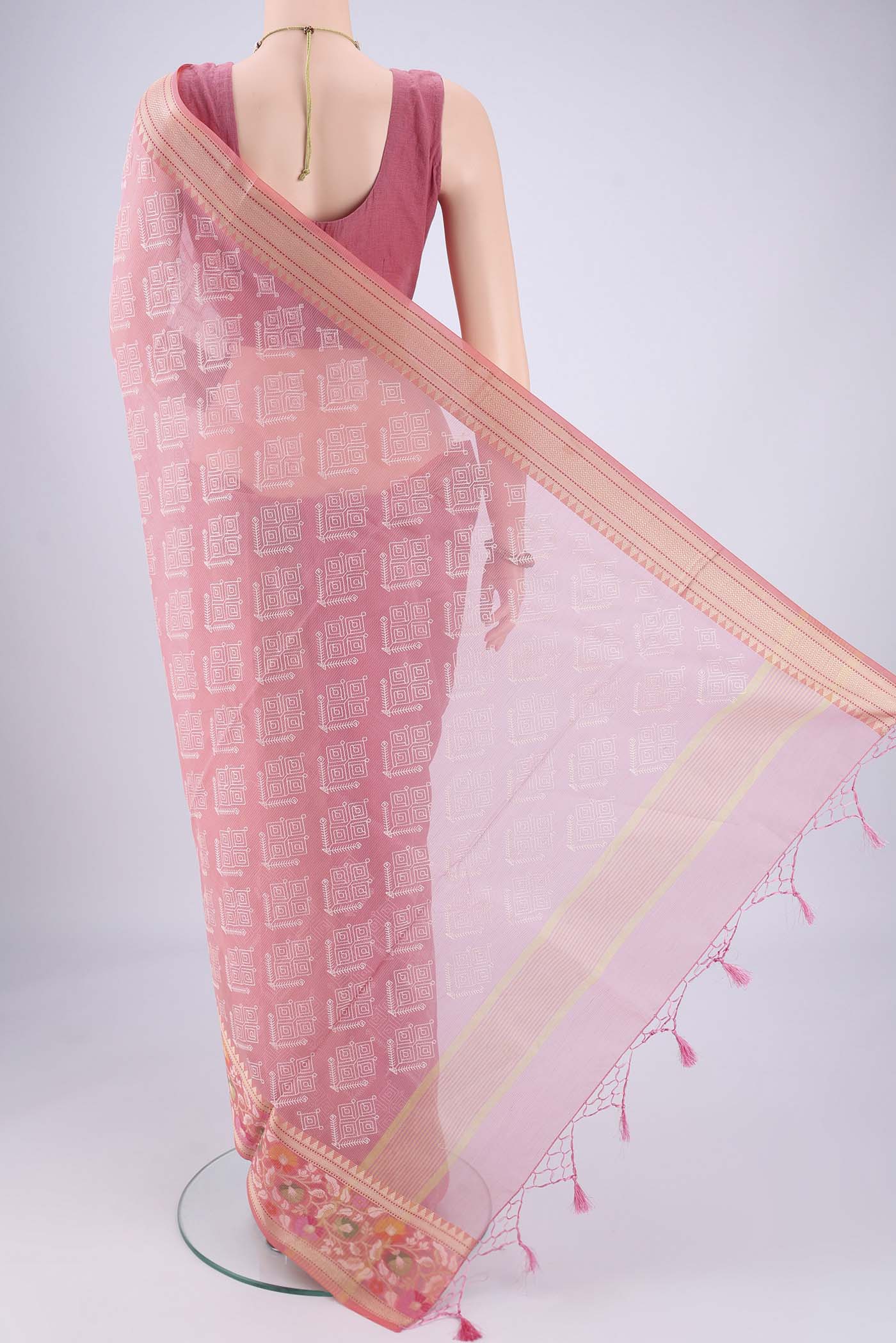 Flat view of Pink Blended Kota Cotton Saree with Embroidery on the body and Thread Border. 
