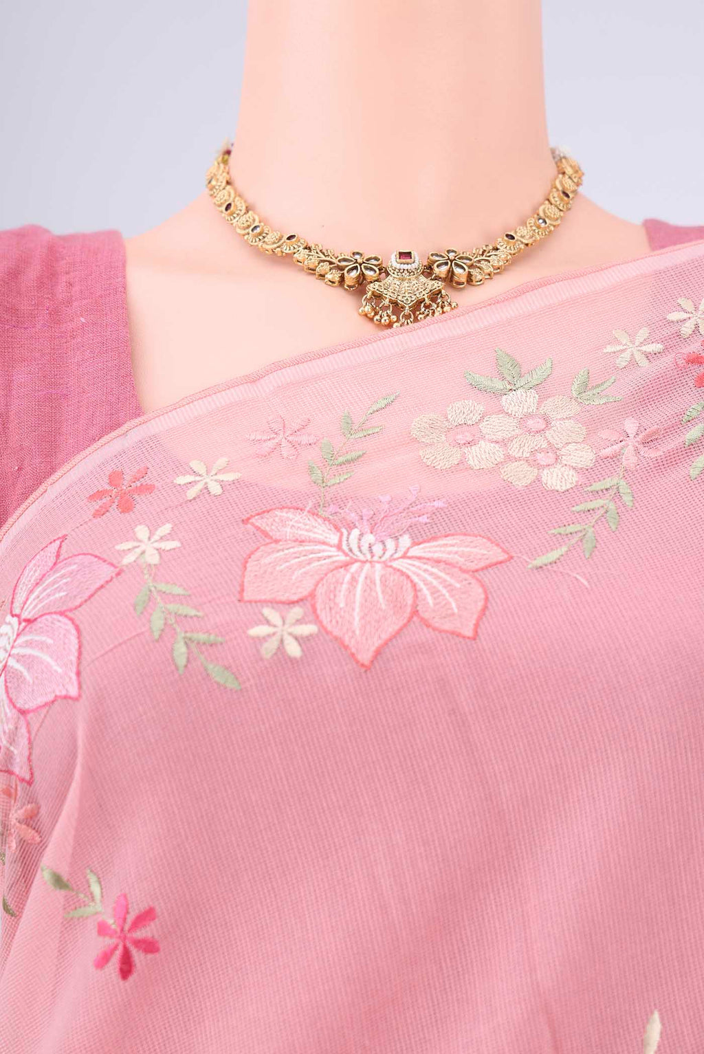 Border image of Peach Blended Kota Cotton Saree with Embroidery on the body and Thread Border. 