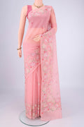 Peach Blended Kota Cotton Saree with Embroidery on the body and Thread Border.  displayed on a mannequin
