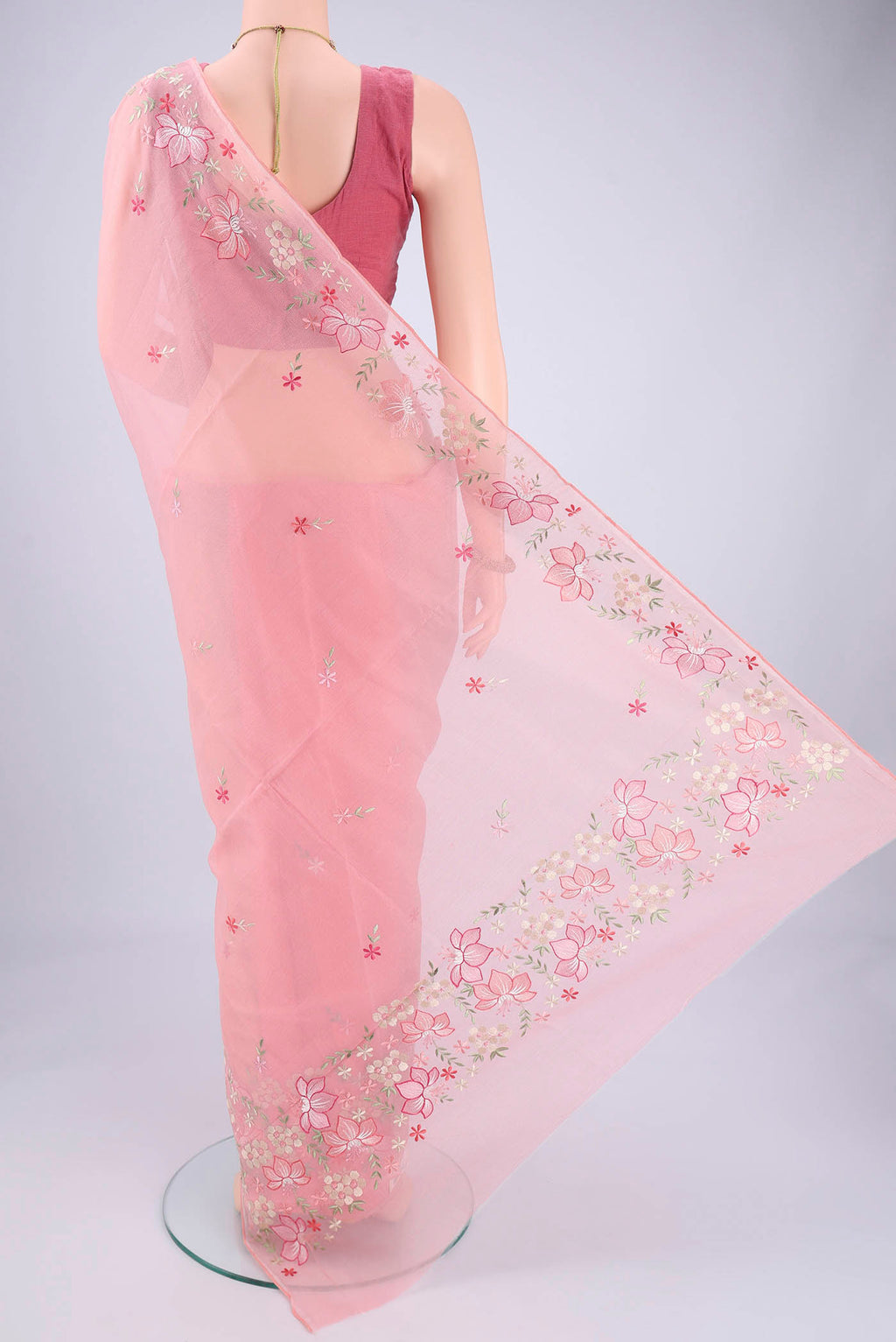 Flat view of Peach Blended Kota Cotton Saree with Embroidery on the body and Thread Border. 