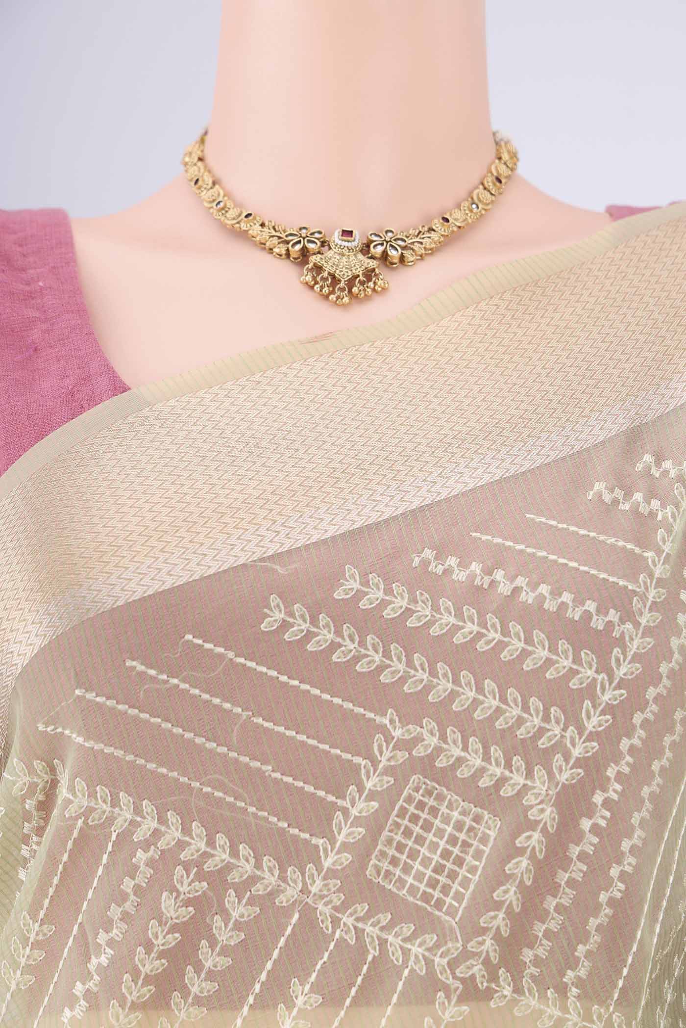 Border image of Light Green Blended Kota Cotton Saree with Embroidery on the body and Zari Border. 
