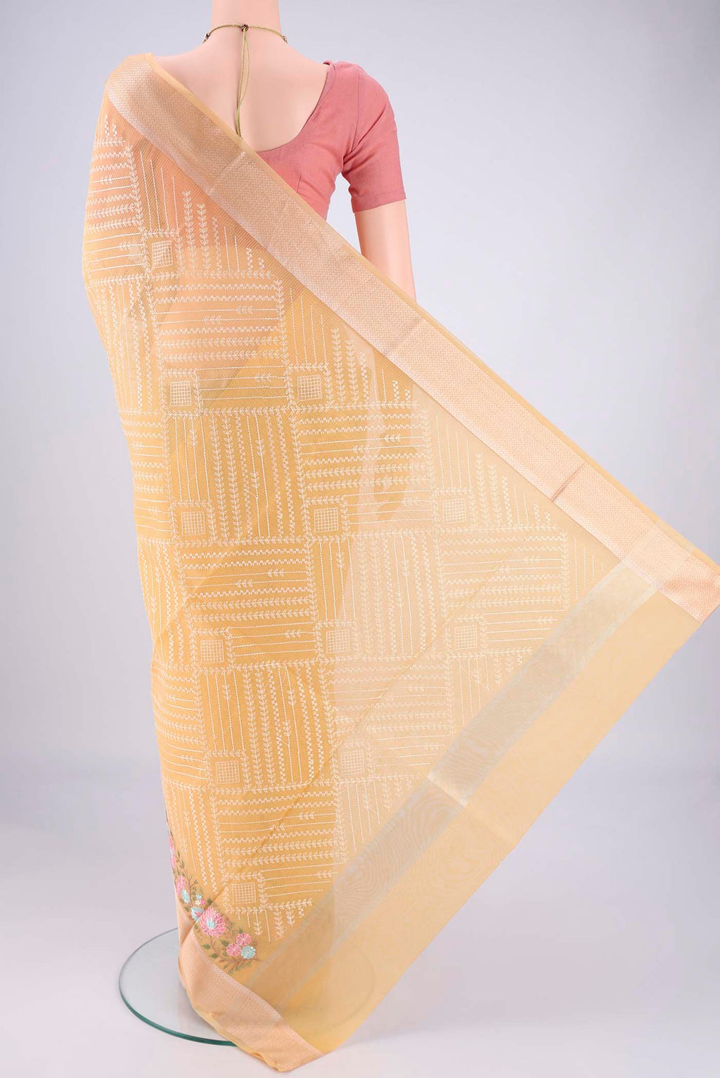 Flat view of Lemon Yellow Blended Kota Cotton Saree with Embroidery on the body and Zari Border. 