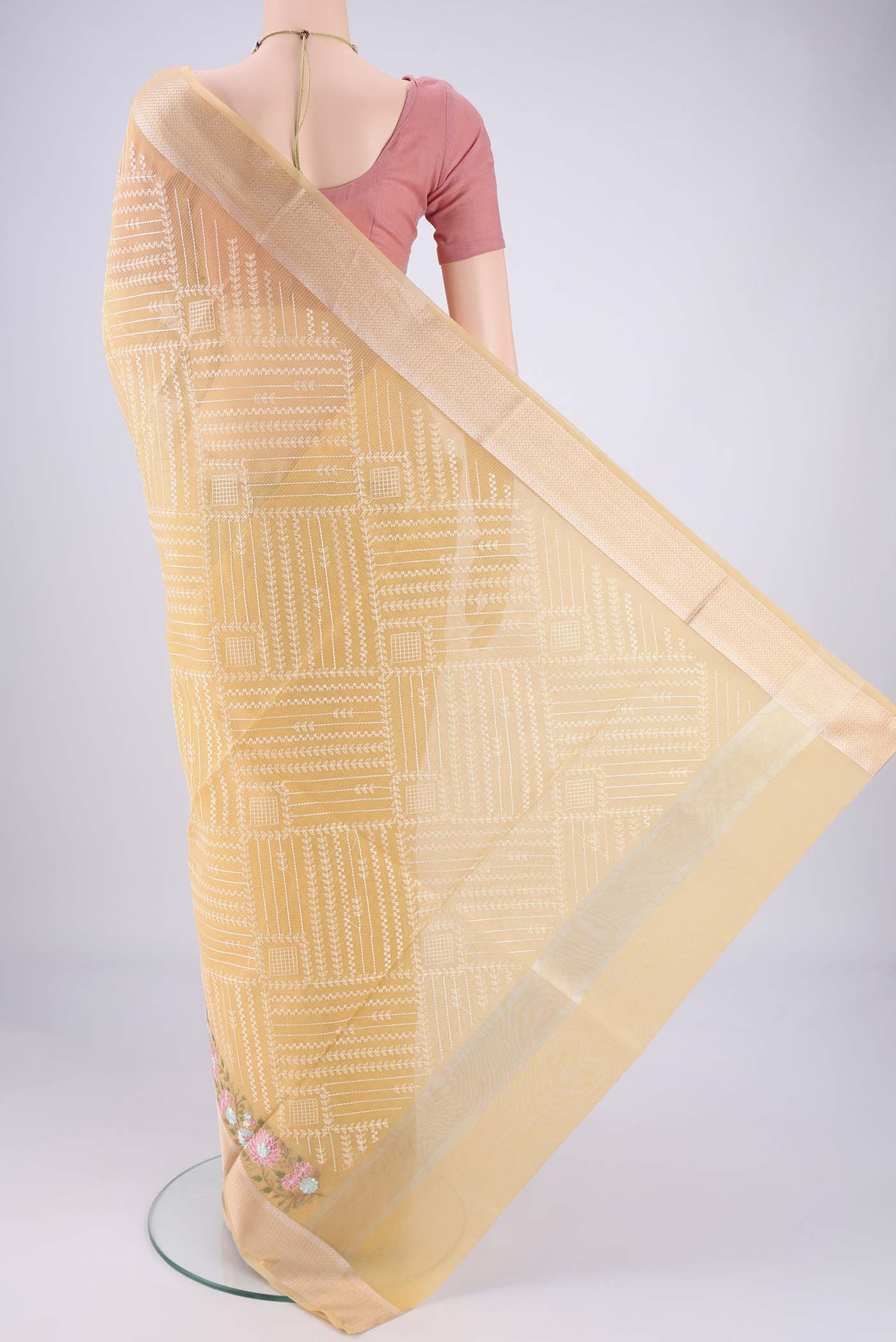 Flat view of Lemon Yellow Blended Kota Cotton Saree with Embroidery on the body and Zari Border. 
