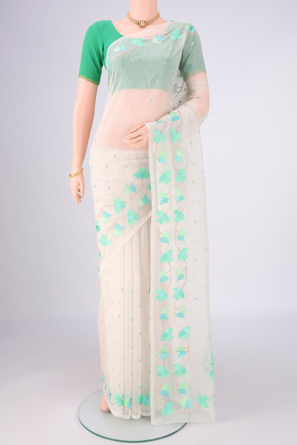 White Blended Kota Cotton Saree with Embroidery on the body and Thread Border.  displayed on a mannequin