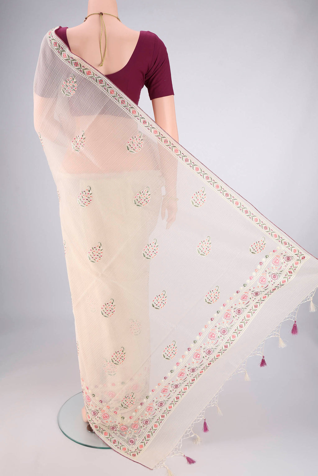 Flat view of Off White Dual Tone Blended Kota Cotton Saree with Embroidery on the body and Thread Border. 