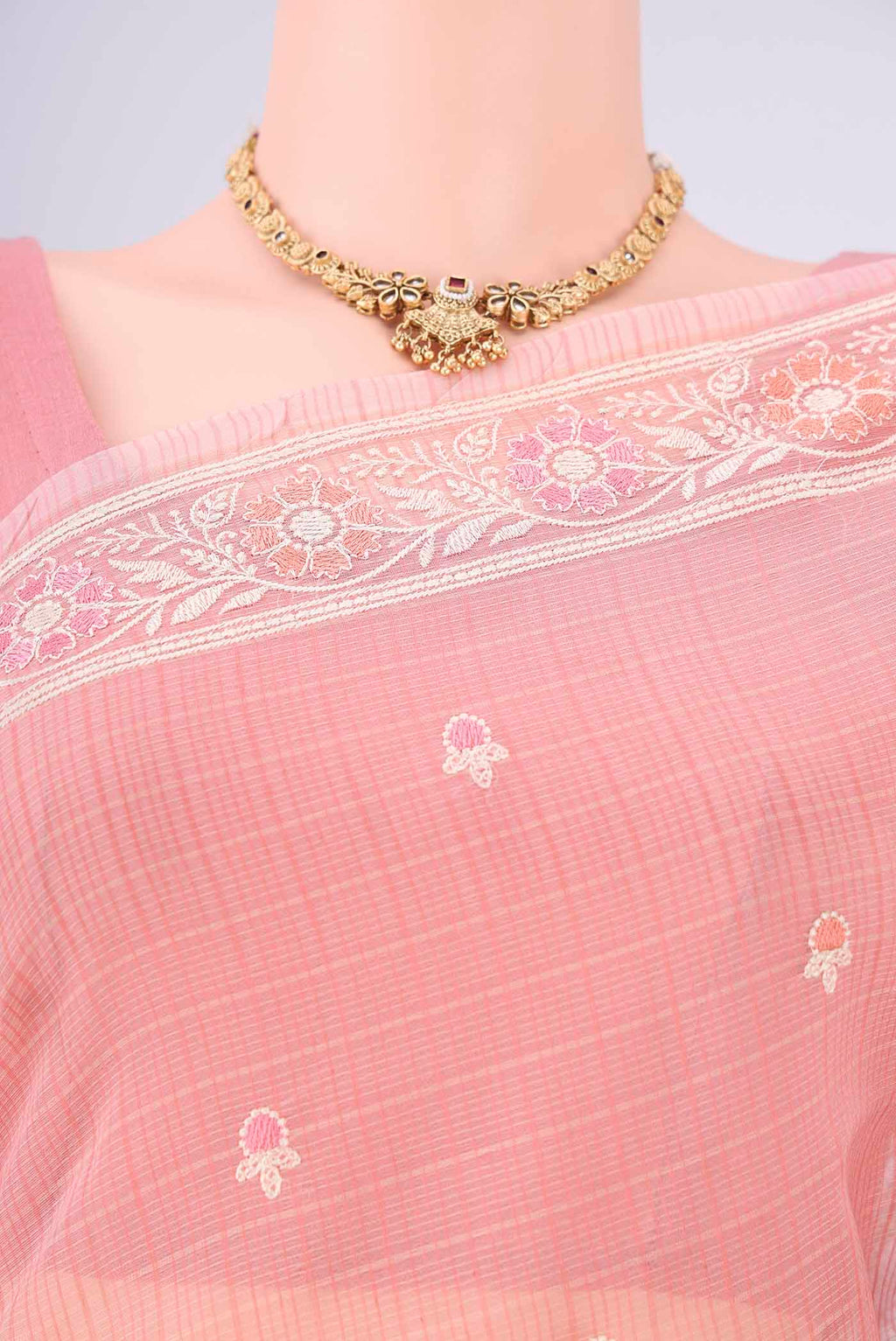 Border image of Peach Blended Kota Cotton Saree with Embroidery on the body and Thread Border. 