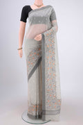 Off White Kota Cotton Saree with Embroidery on the body and Thread Border.  displayed on a mannequin