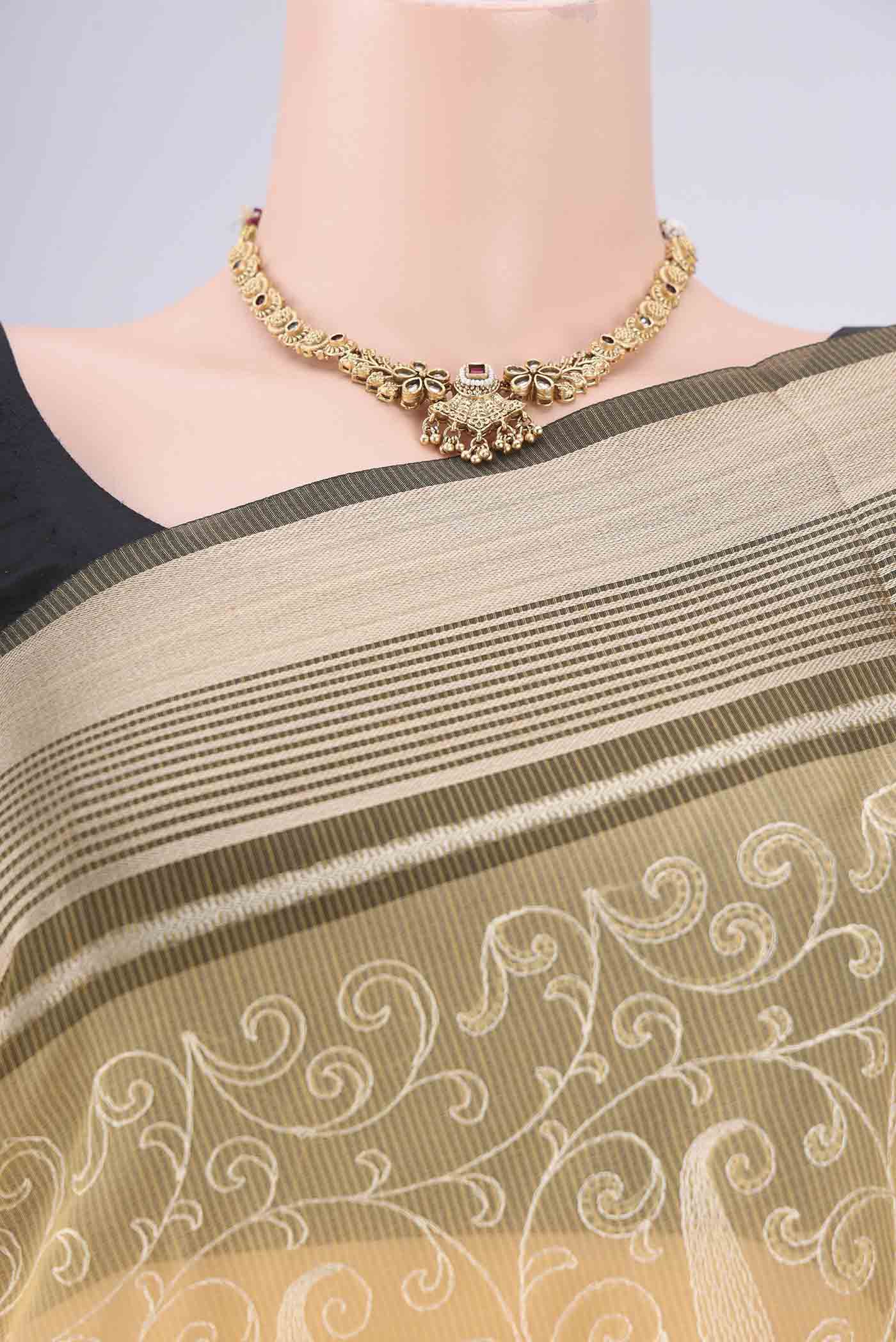 Border image of Yellow Blended Kota Cotton Saree with Embroidery on the body and Zari Border. 