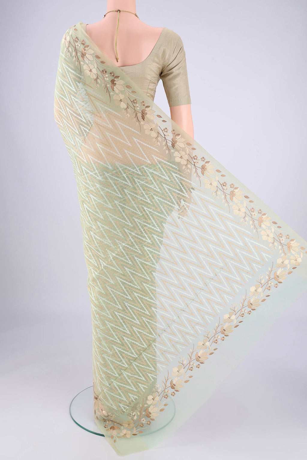 Flat view of Pista Green Blended Kota Cotton Saree with Embroidery on the body and Thread Border. 
