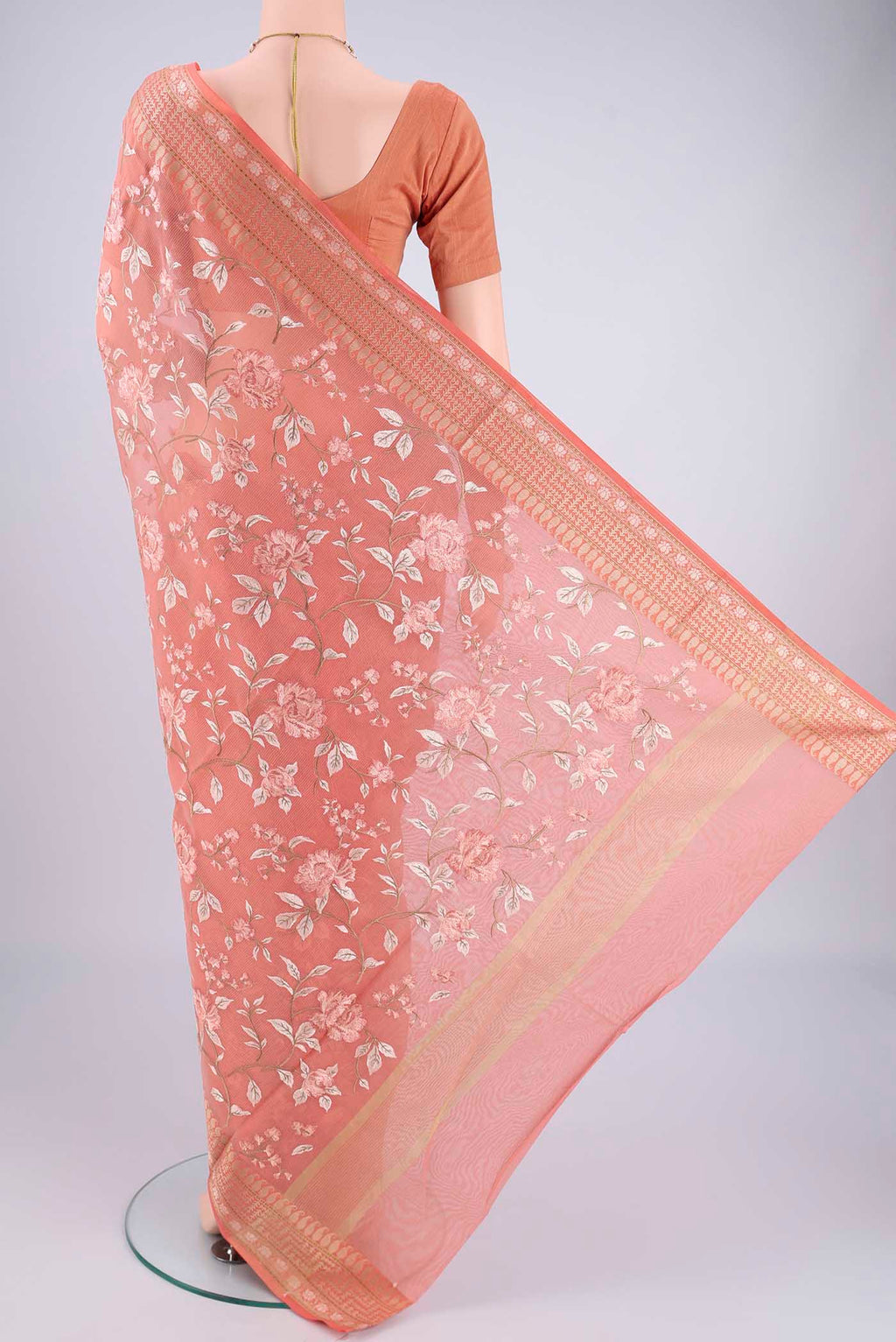 Flat view of Peach Blended Kota Cotton Saree with Embroidery on the body and Thread Border. 