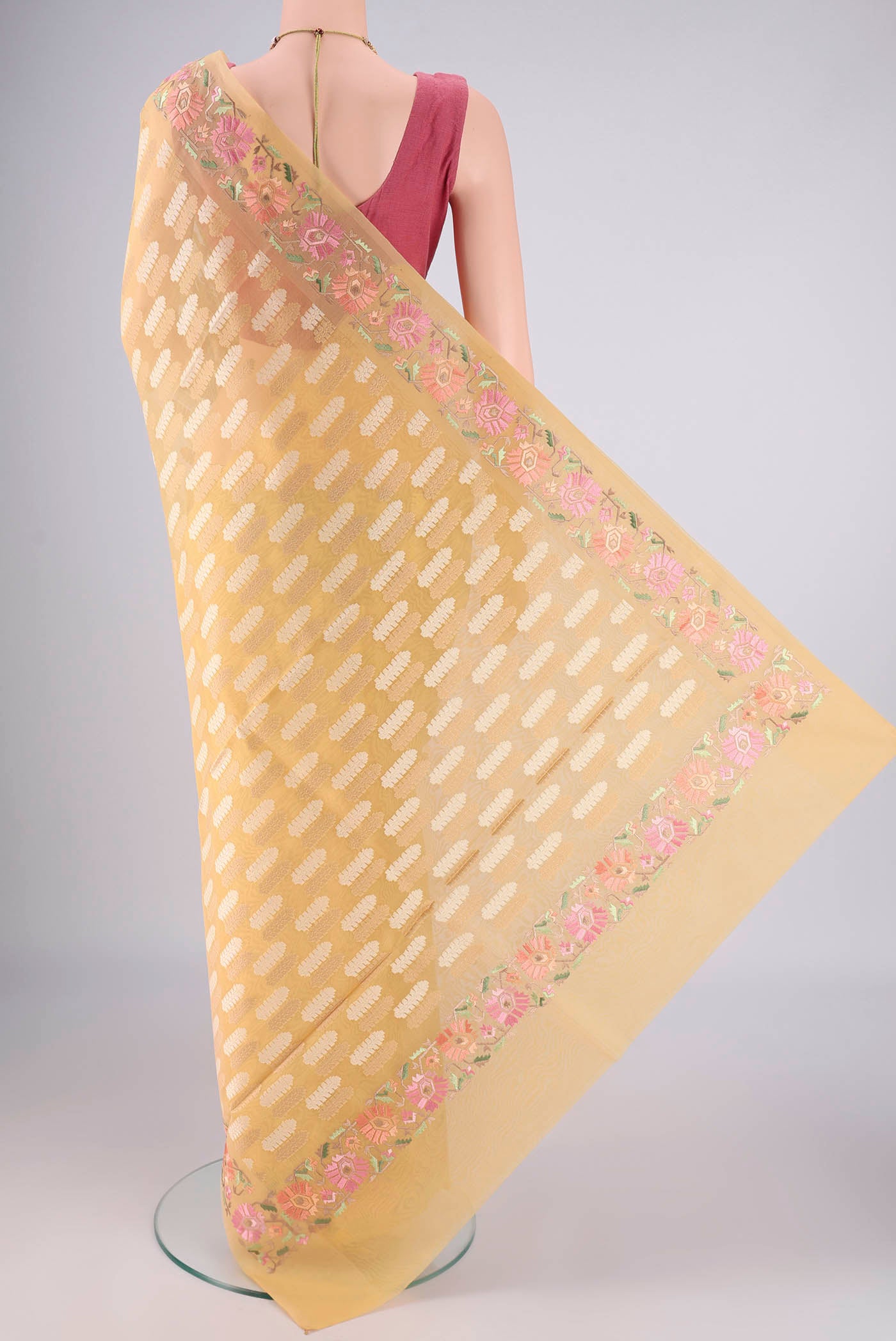 Flat view of Sandal Blended Kota Cotton Saree with Zari And Thread Butta on the body and Thread Border. 
