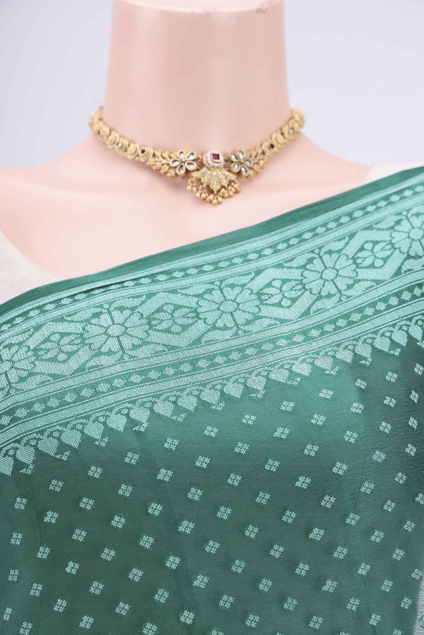 Border image of Green Blended Banarasi Georgette Saree with Thread Butta on the body and Thread Border. 