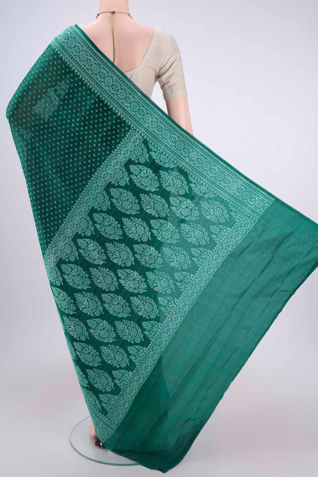 Flat view of Green Blended Banarasi Georgette Saree with Thread Butta on the body and Thread Border. 