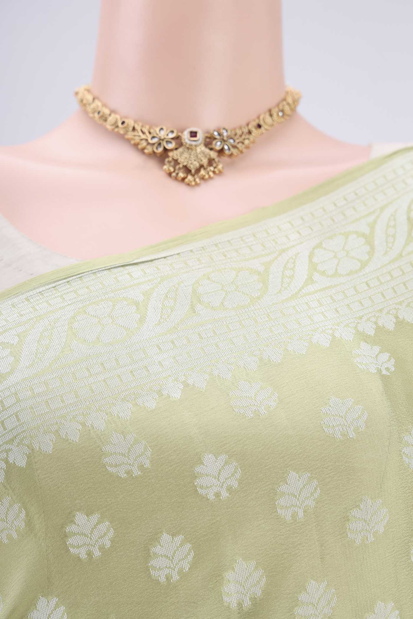 Border image of Pista Green Blended Banarasi Georgette Saree with Thread Butta on the body and Thread Border. 
