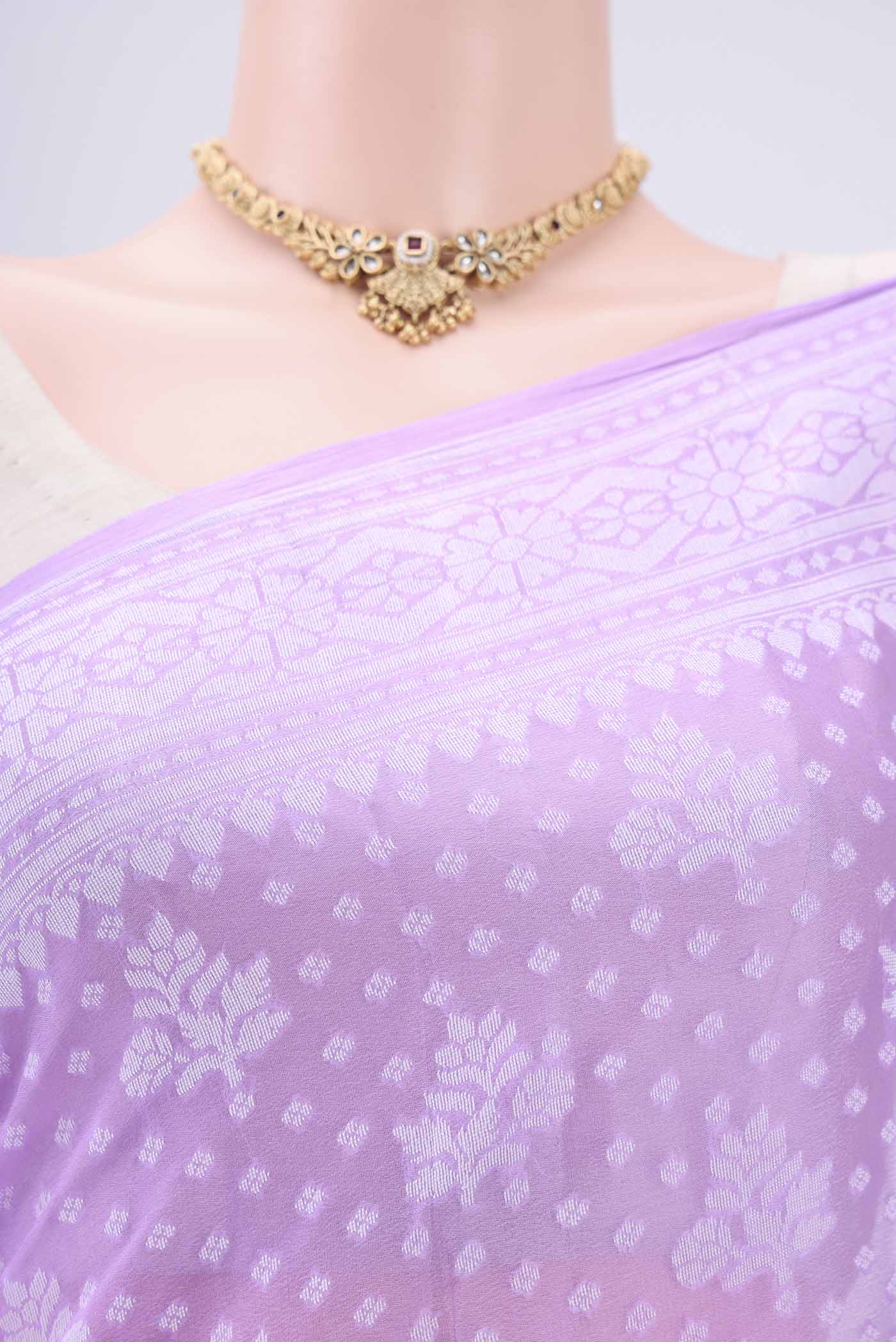 Border image of Lilac Blended Banarasi Georgette Saree with Thread Butta on the body and Thread Border. 