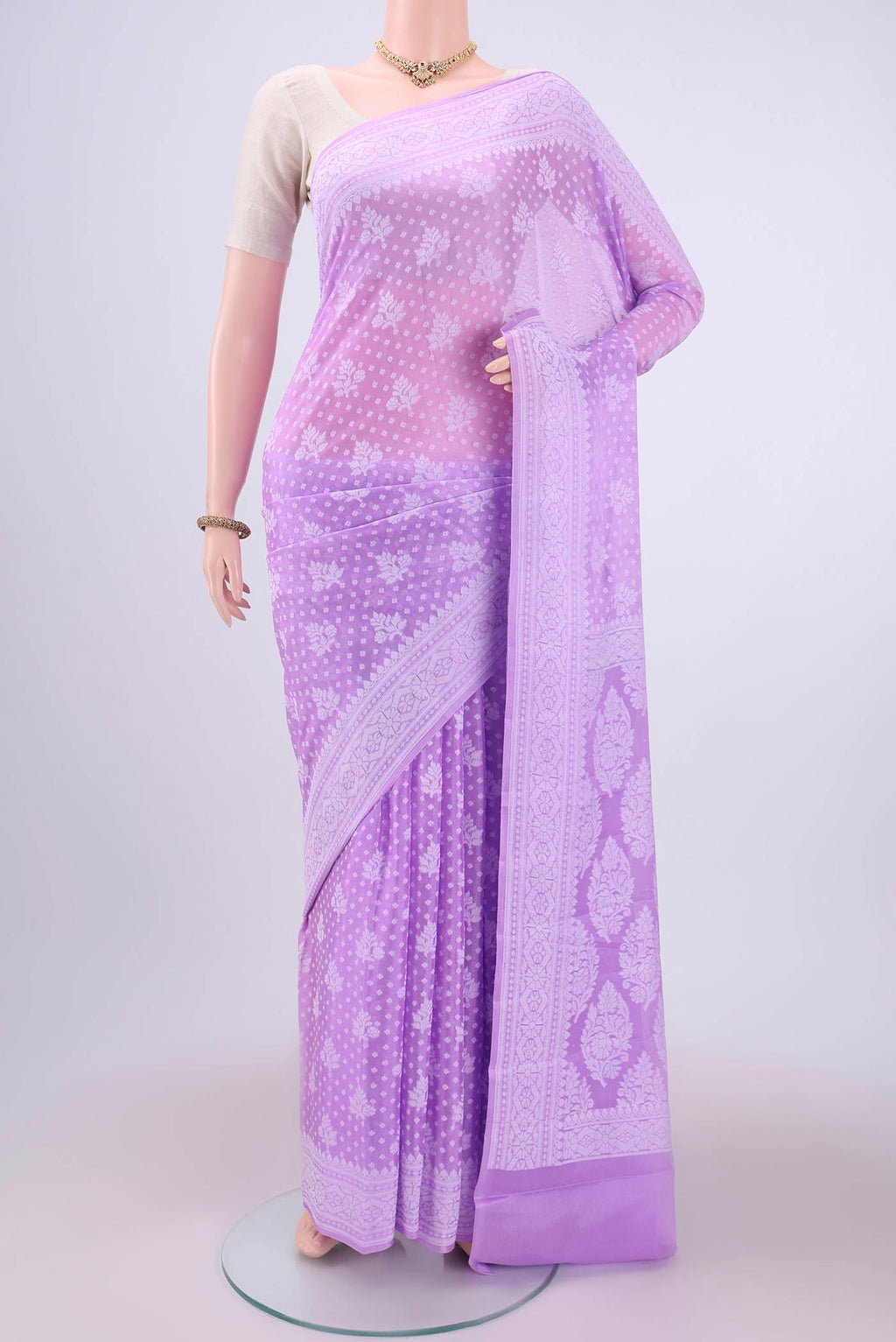 Lilac Blended Banarasi Georgette Saree with Thread Butta on the body and Thread Border.  displayed on a mannequin