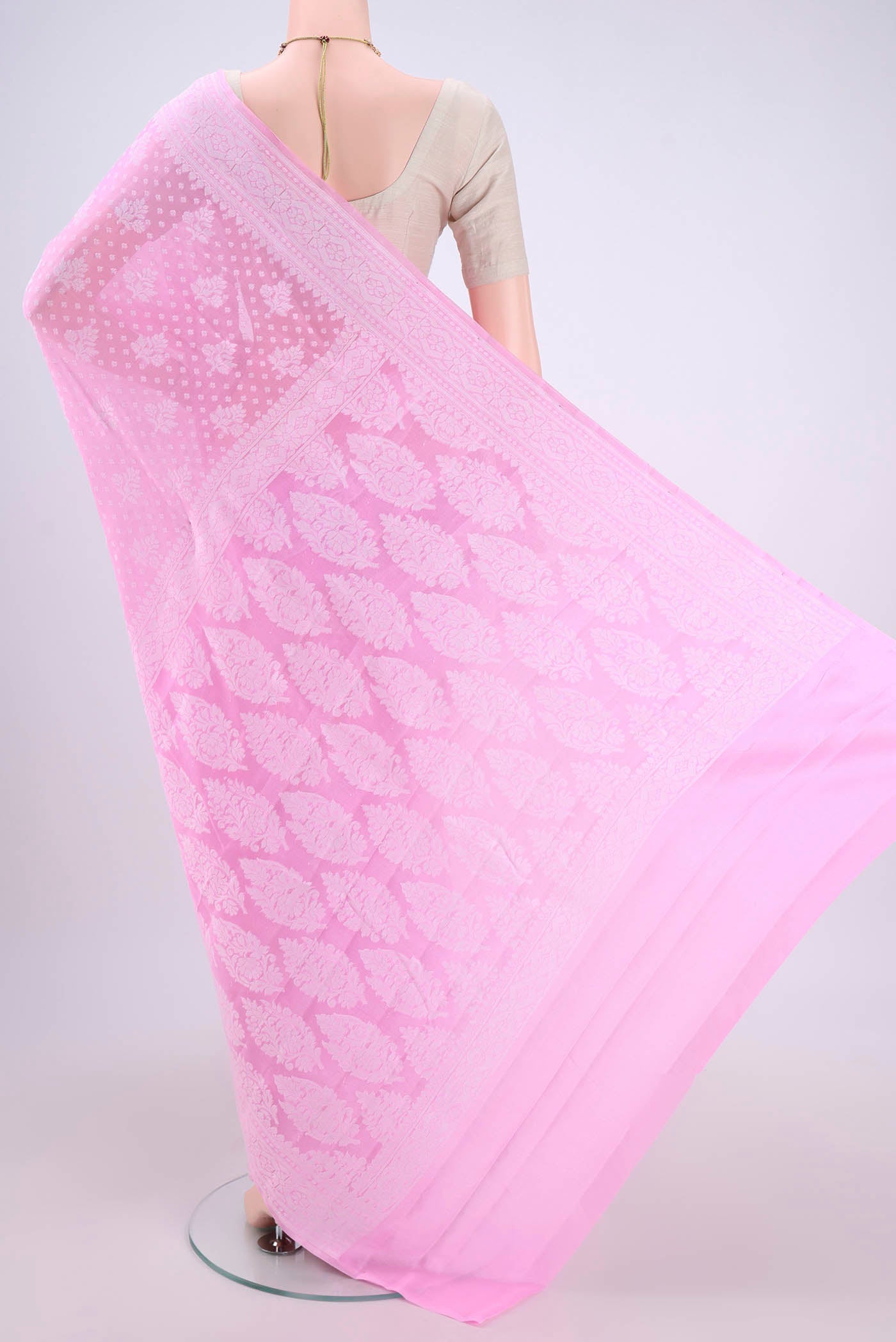 Flat view of Rose pink Blended Banarasi Georgette Saree with Thread Butta on the body and Thread Border. 
