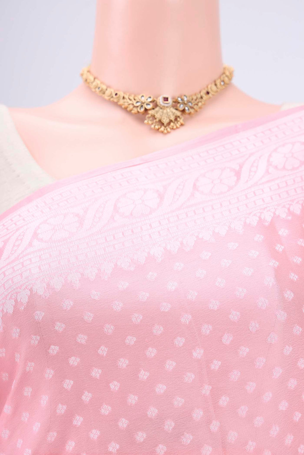 Border image of Peach Blended Banarasi Georgette Saree with Thread Butta on the body and Thread Border. 