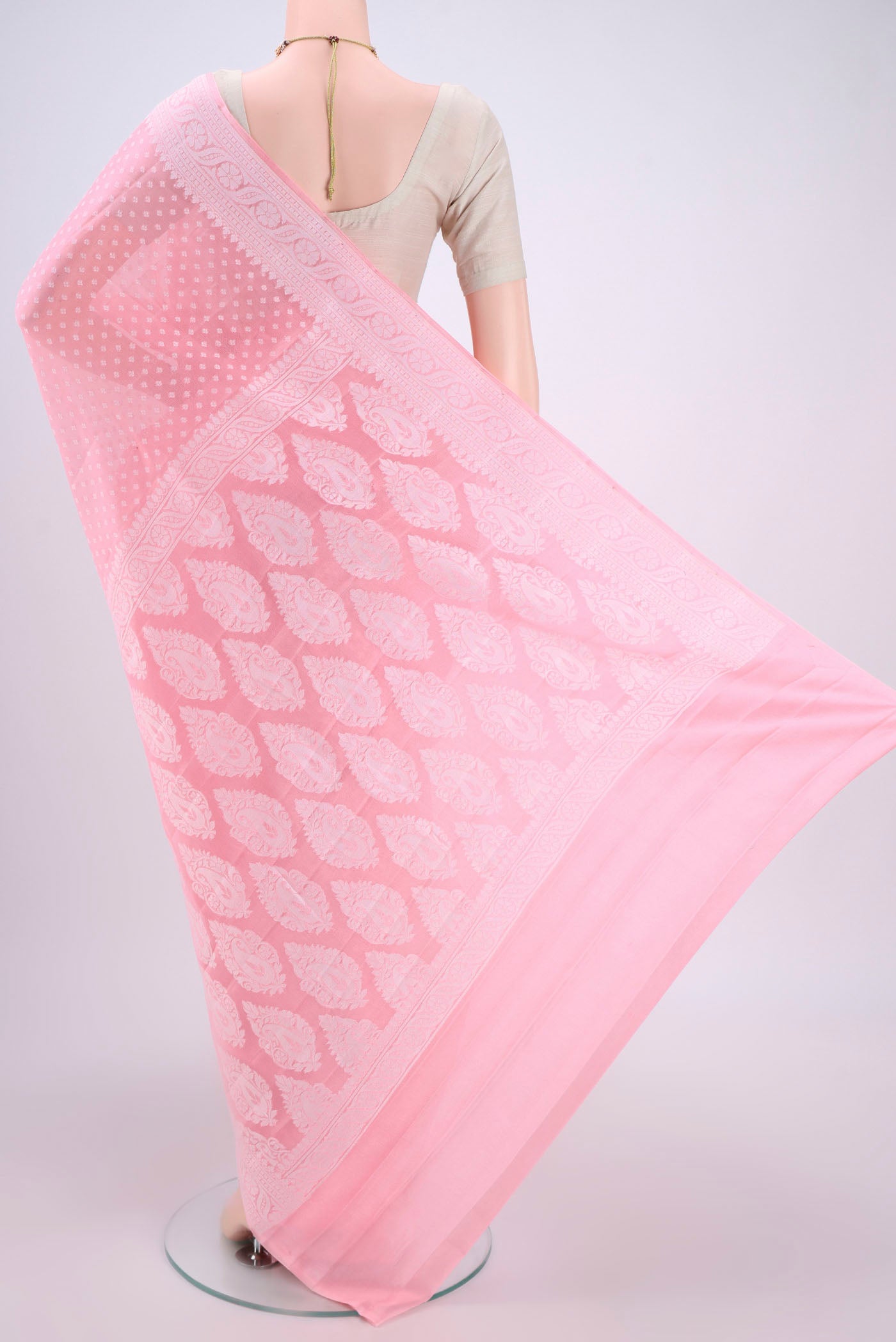 Flat view of Peach Blended Banarasi Georgette Saree with Thread Butta on the body and Thread Border. 