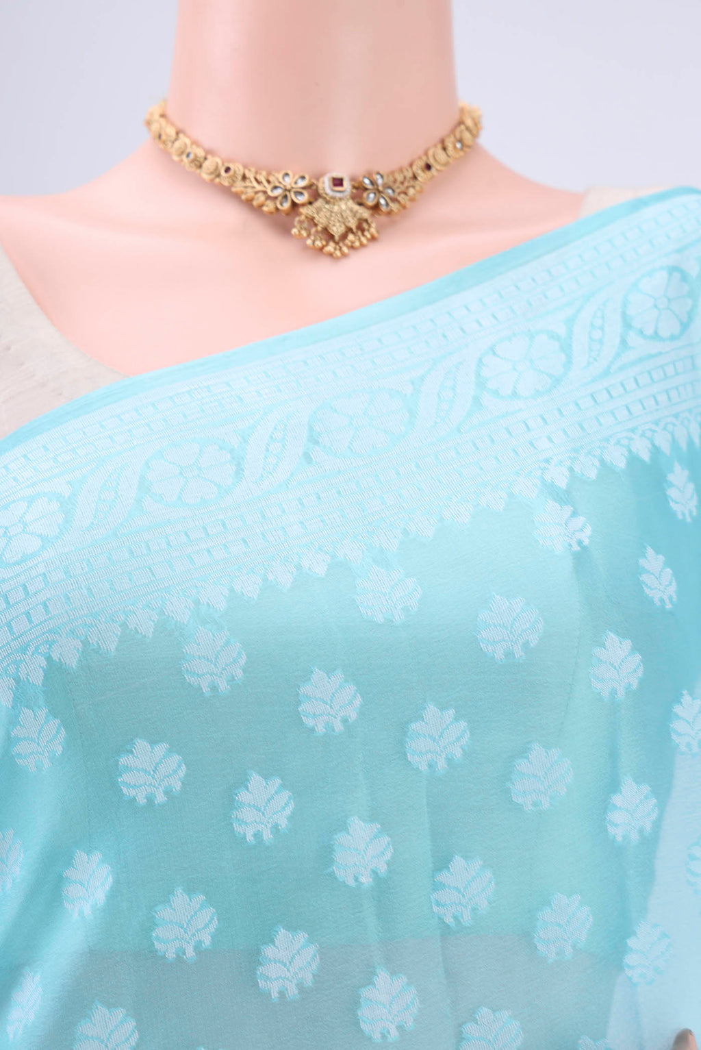 Border image of Sky Blue Blended Banarasi Georgette Saree with Thread Butta on the body and Thread Border. 