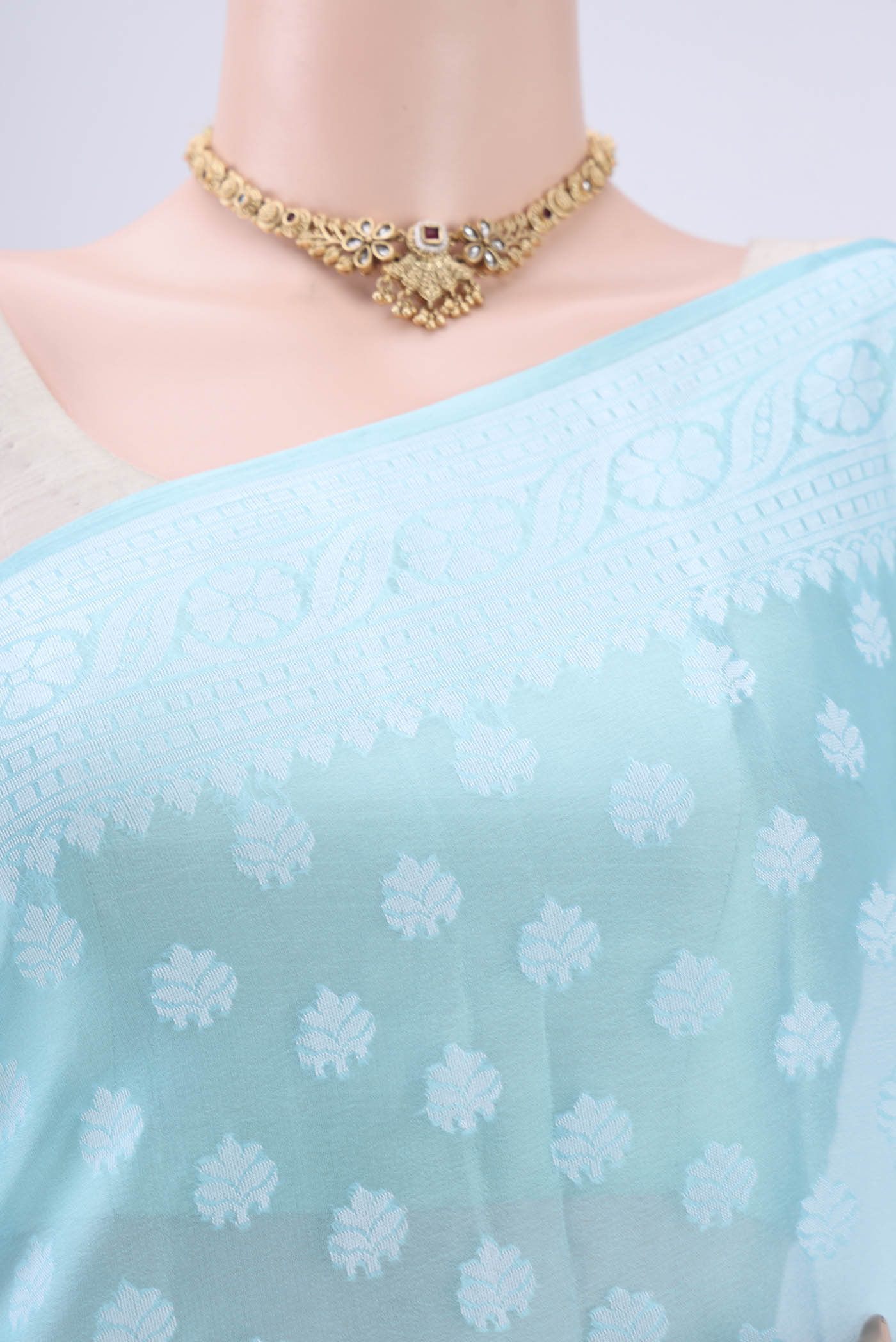 Border image of Sky Blue Blended Banarasi Georgette Saree with Thread Butta on the body and Thread Border. 