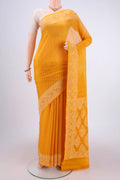 Mustard Blended Banarasi Georgette Saree with Thread Butta on the body and Thread Border.  displayed on a mannequin