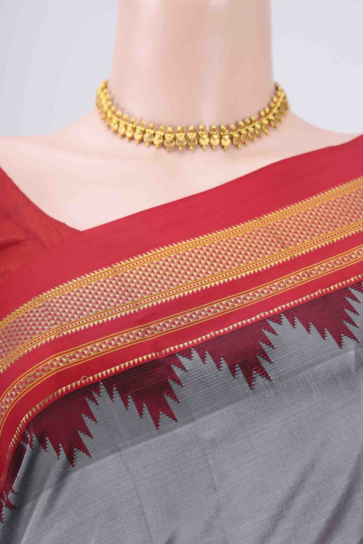 Border image of Grey Bangalore Silk Saree with Embroidery on the body and Temple Border. 