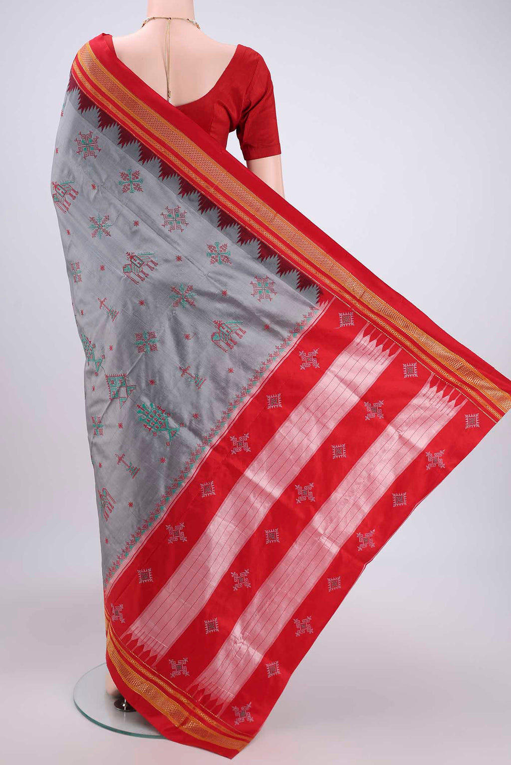 Flat view of Grey Bangalore Silk Saree with Embroidery on the body and Temple Border. 