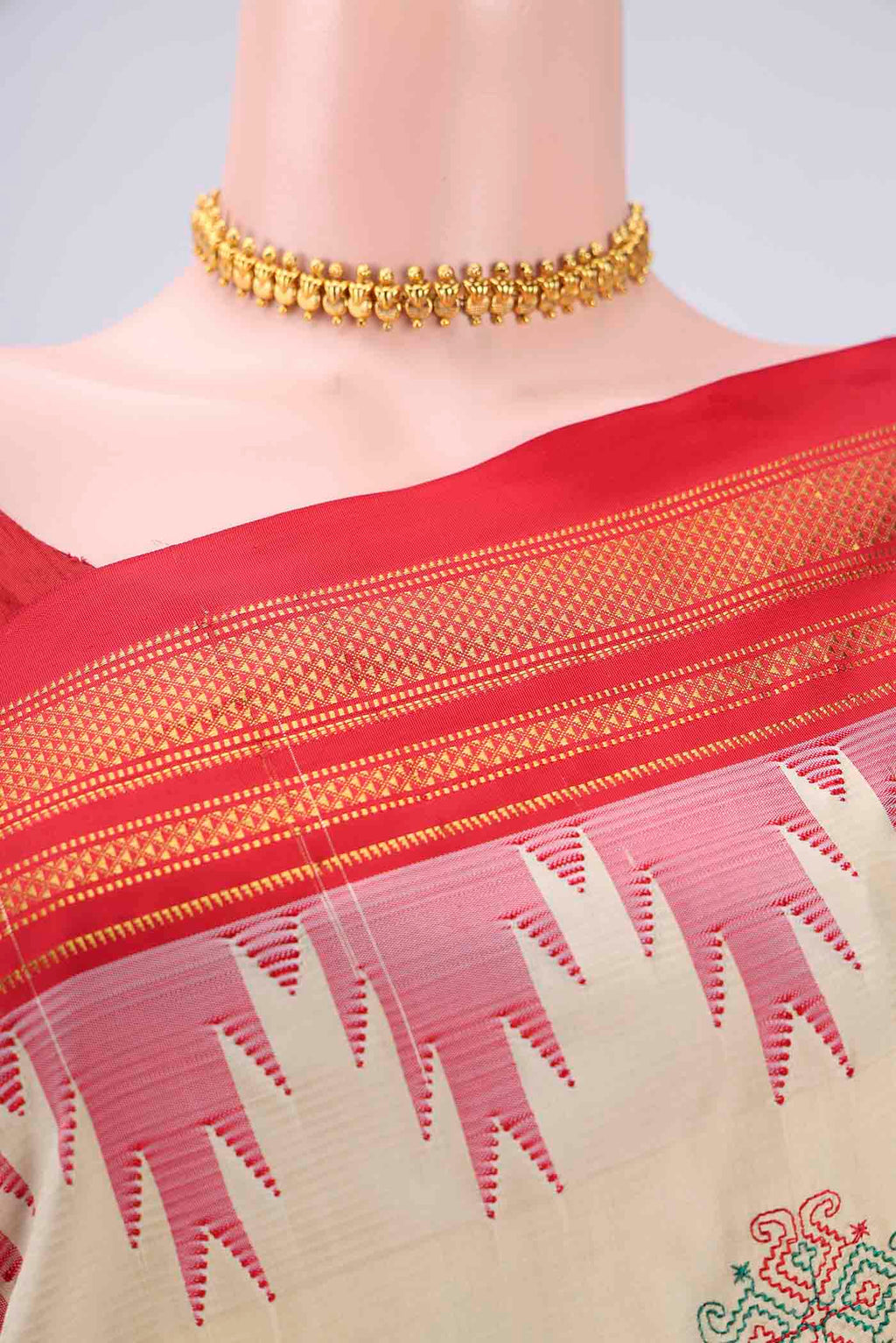 Border image of Cream Bangalore Silk Saree with Embroidery on the body and Temple Border. 