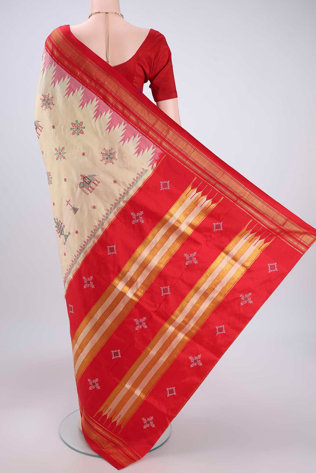 Flat view of Cream Bangalore Silk Saree with Embroidery on the body and Temple Border. 