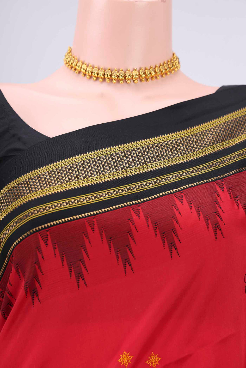 Border image of Red Bangalore Silk Saree with Embroidery on the body and Temple Border. 