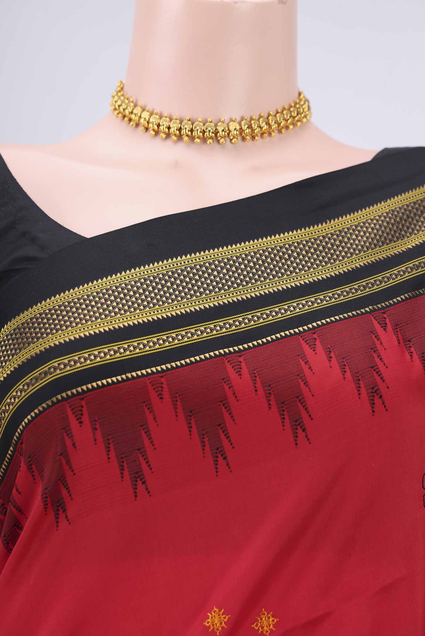 Border image of Red Bangalore Silk Saree with Embroidery on the body and Temple Border. 