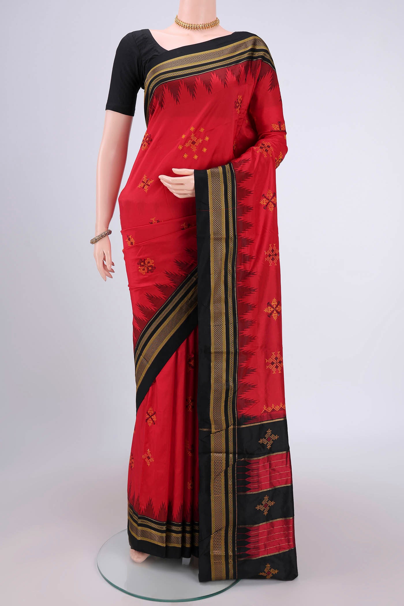 Red Bangalore Silk Saree with Embroidery on the body and Temple Border.  displayed on a mannequin