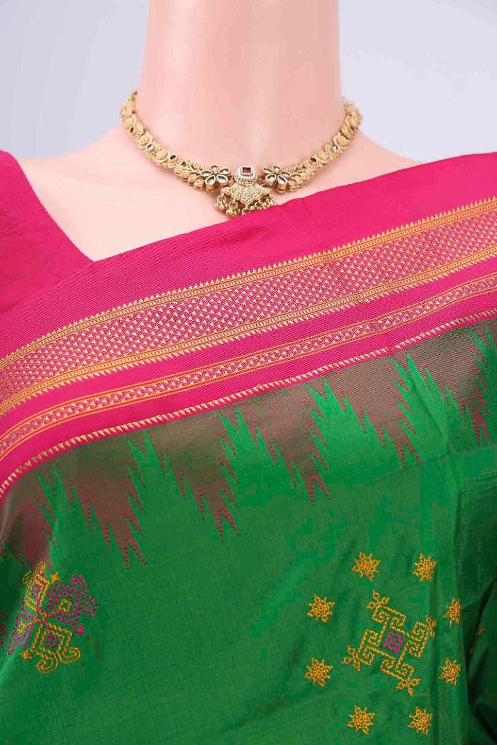 Border image of Green Bangalore Silk Saree with Embroidery on the body and Temple Border. 