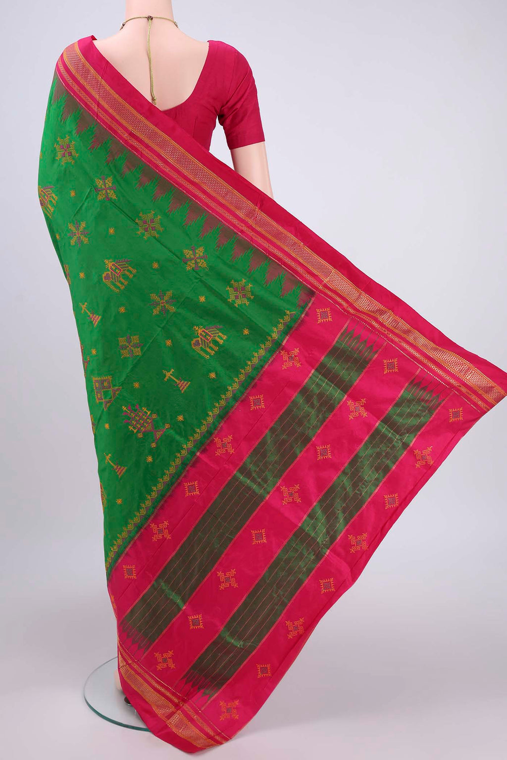Flat view of Green Bangalore Silk Saree with Embroidery on the body and Temple Border. 