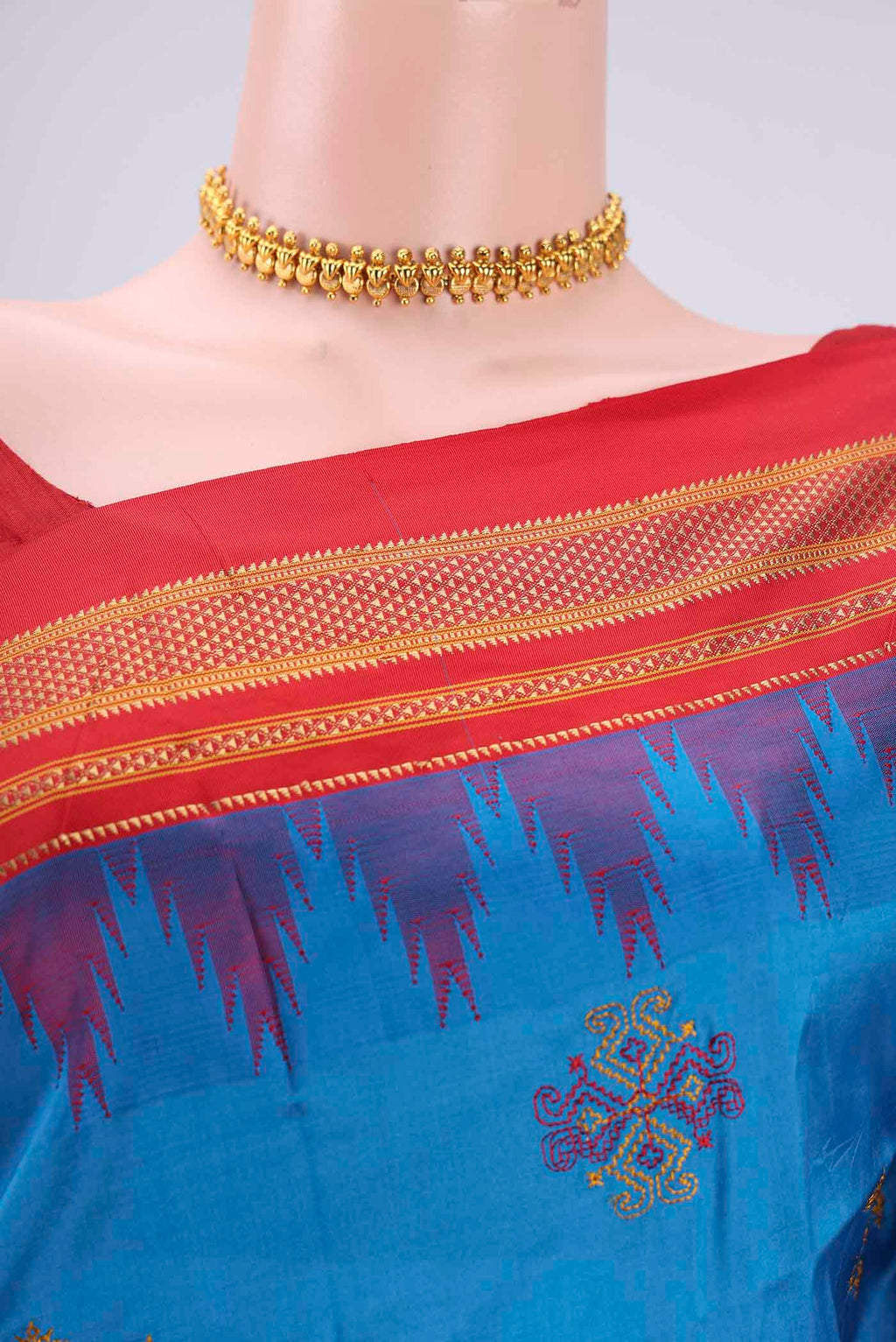 Border image of Blue Bangalore Silk Saree with Embroidery on the body and Temple Border. 