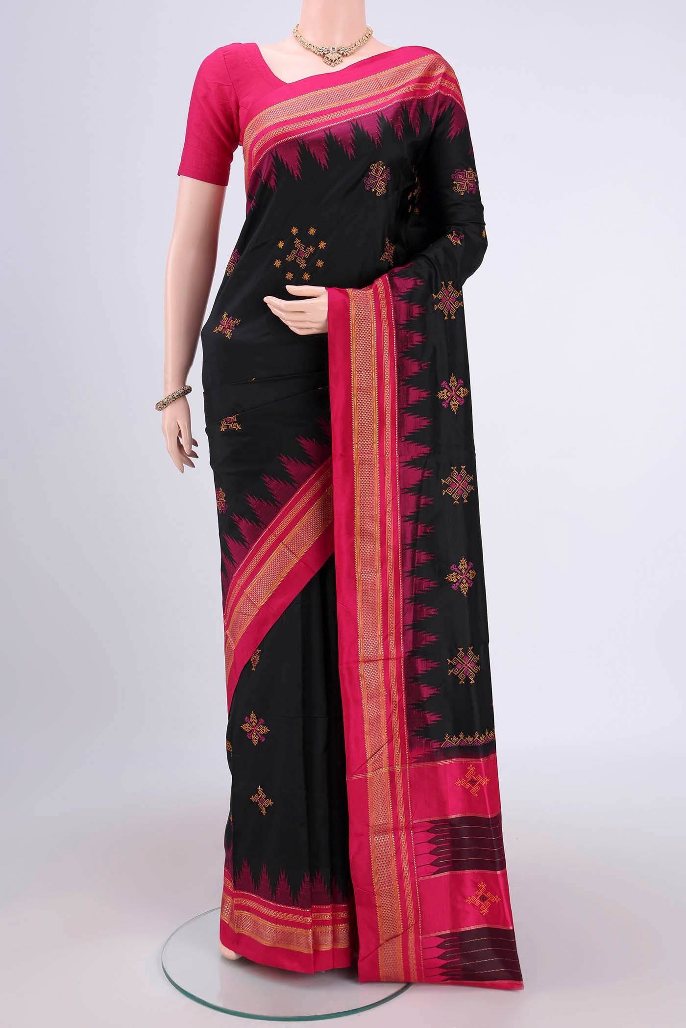 Black Bangalore Silk Saree with Embroidery on the body and Temple Border.  displayed on a mannequin