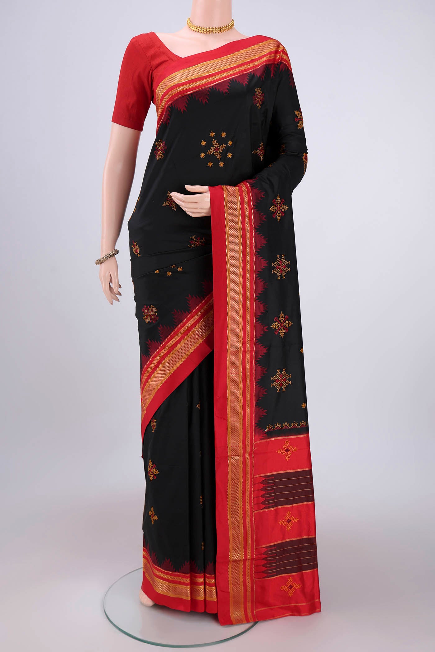 Black Bangalore Silk Saree with Embroidery on the body and Temple Border.  displayed on a mannequin