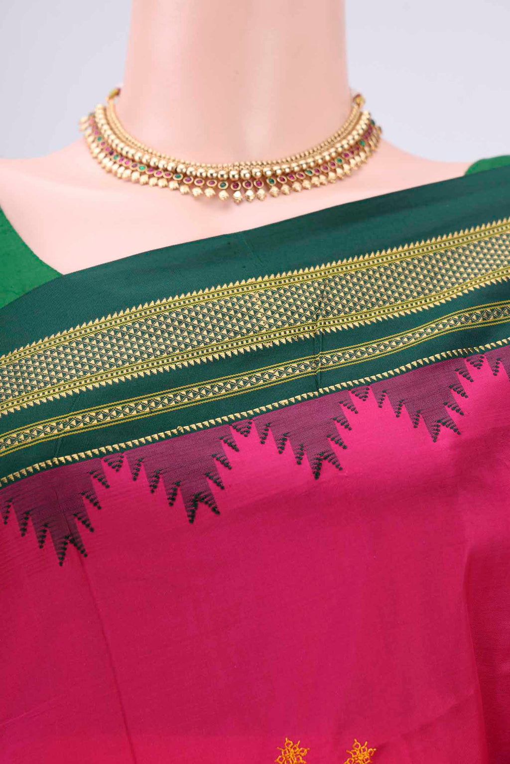 Border image of Rani Pink Bangalore Silk Saree with Embroidery on the body and Temple Border. 