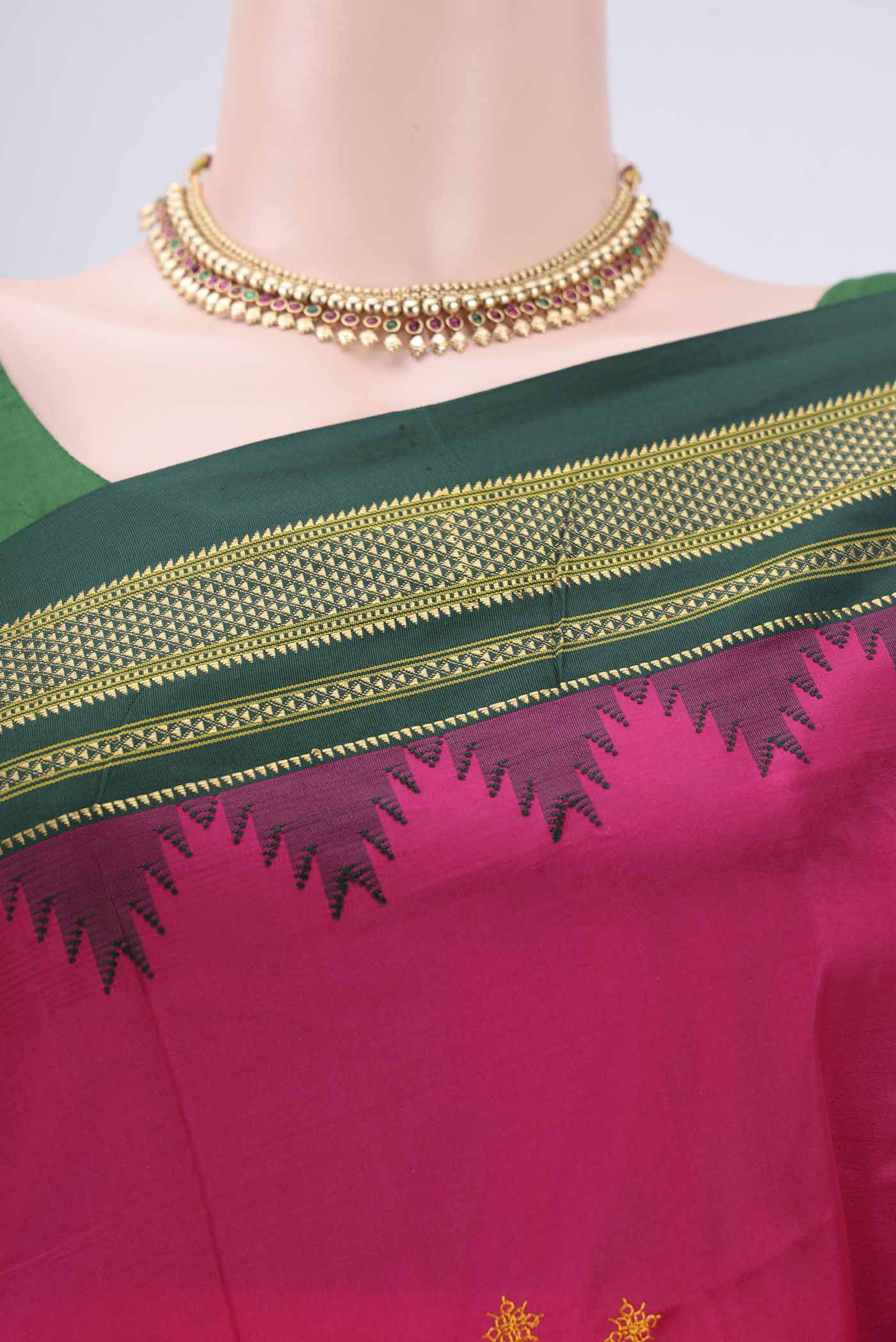 Border image of Rani Pink Bangalore Silk Saree with Embroidery on the body and Temple Border. 