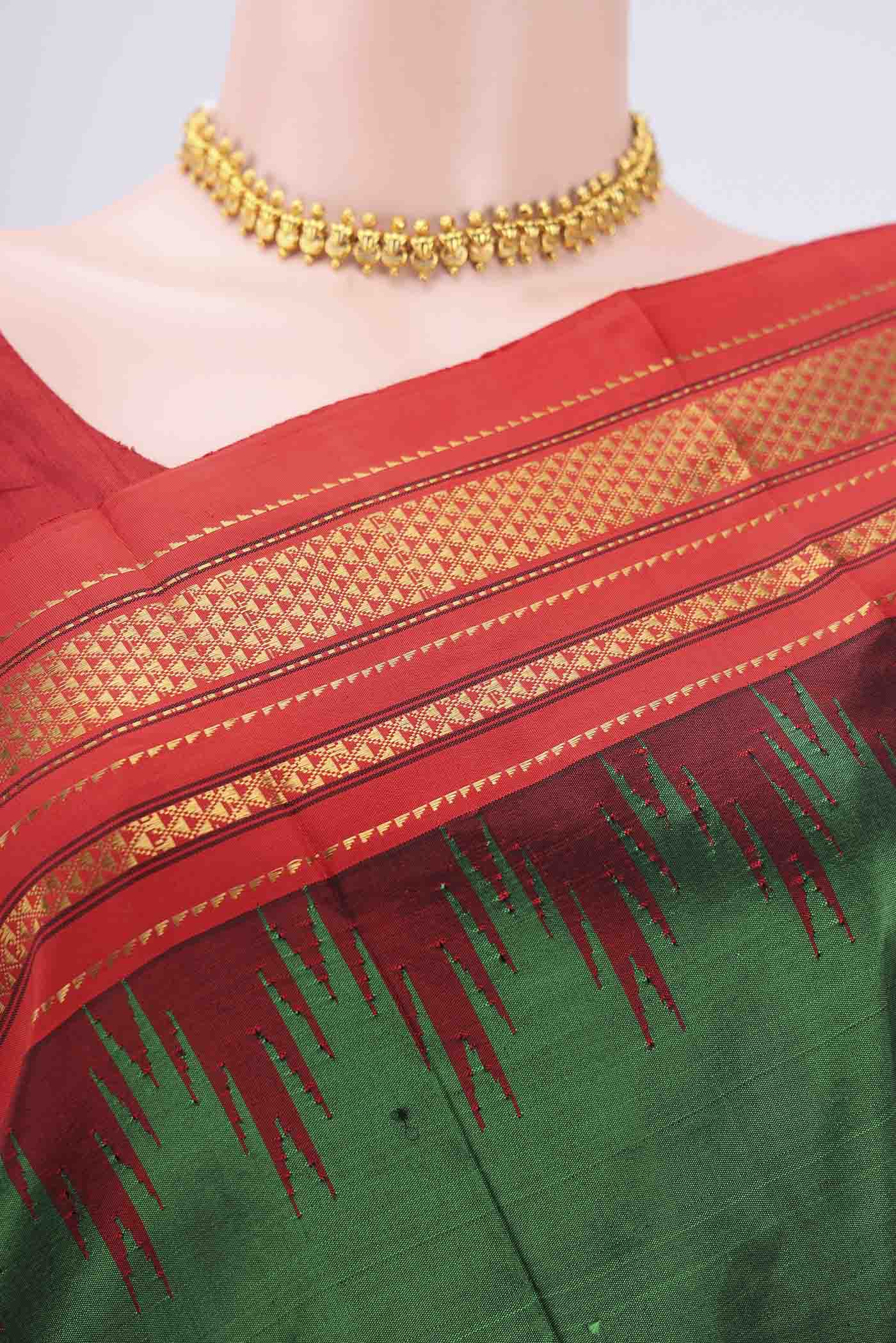 Border image of Bottle Green Bangalore Silk Saree with Plain Body and Temple Border. 