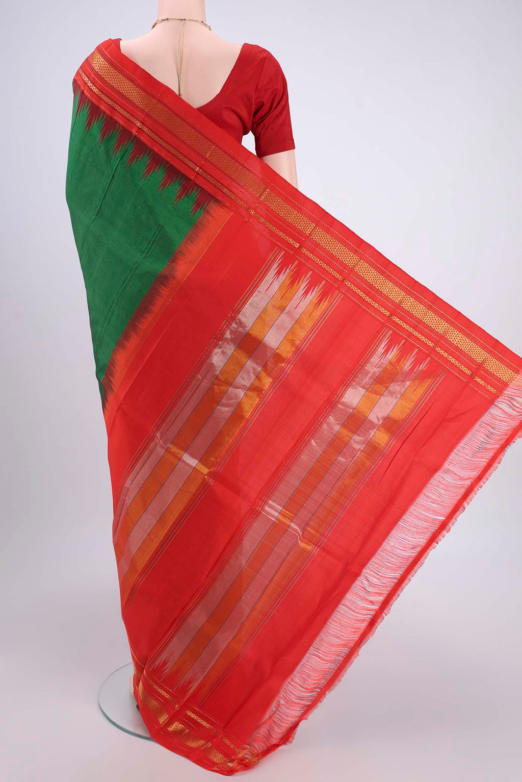 Flat view of Bottle Green Bangalore Silk Saree with Plain Body and Temple Border. 