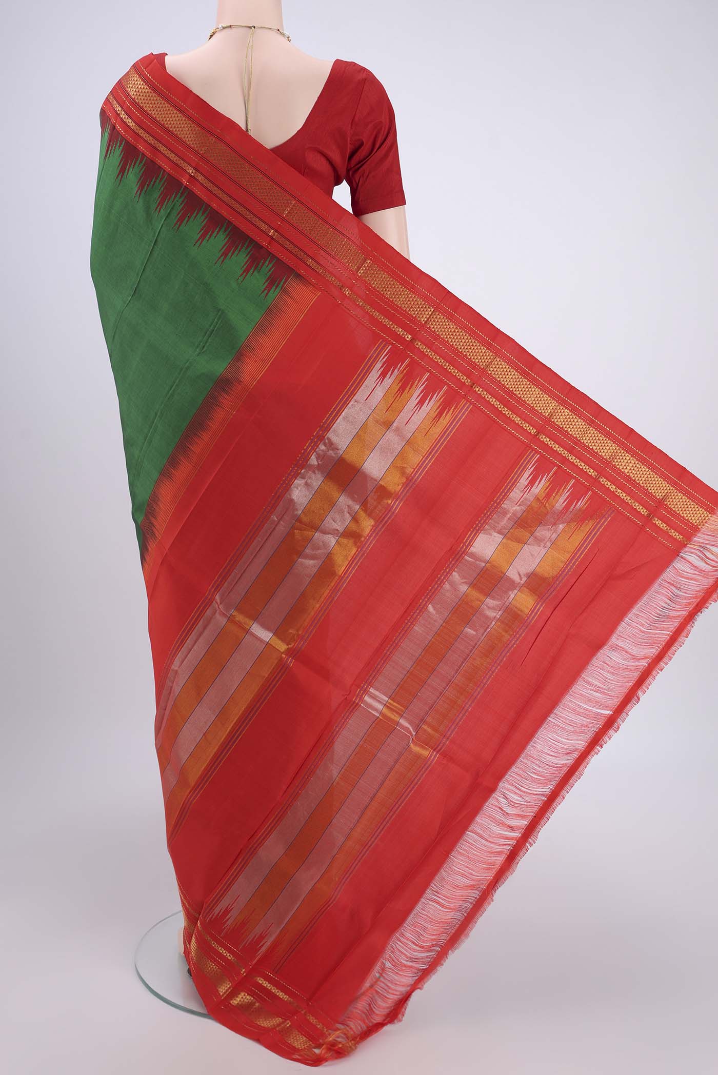 Flat view of Bottle Green Bangalore Silk Saree with Plain Body and Temple Border. 