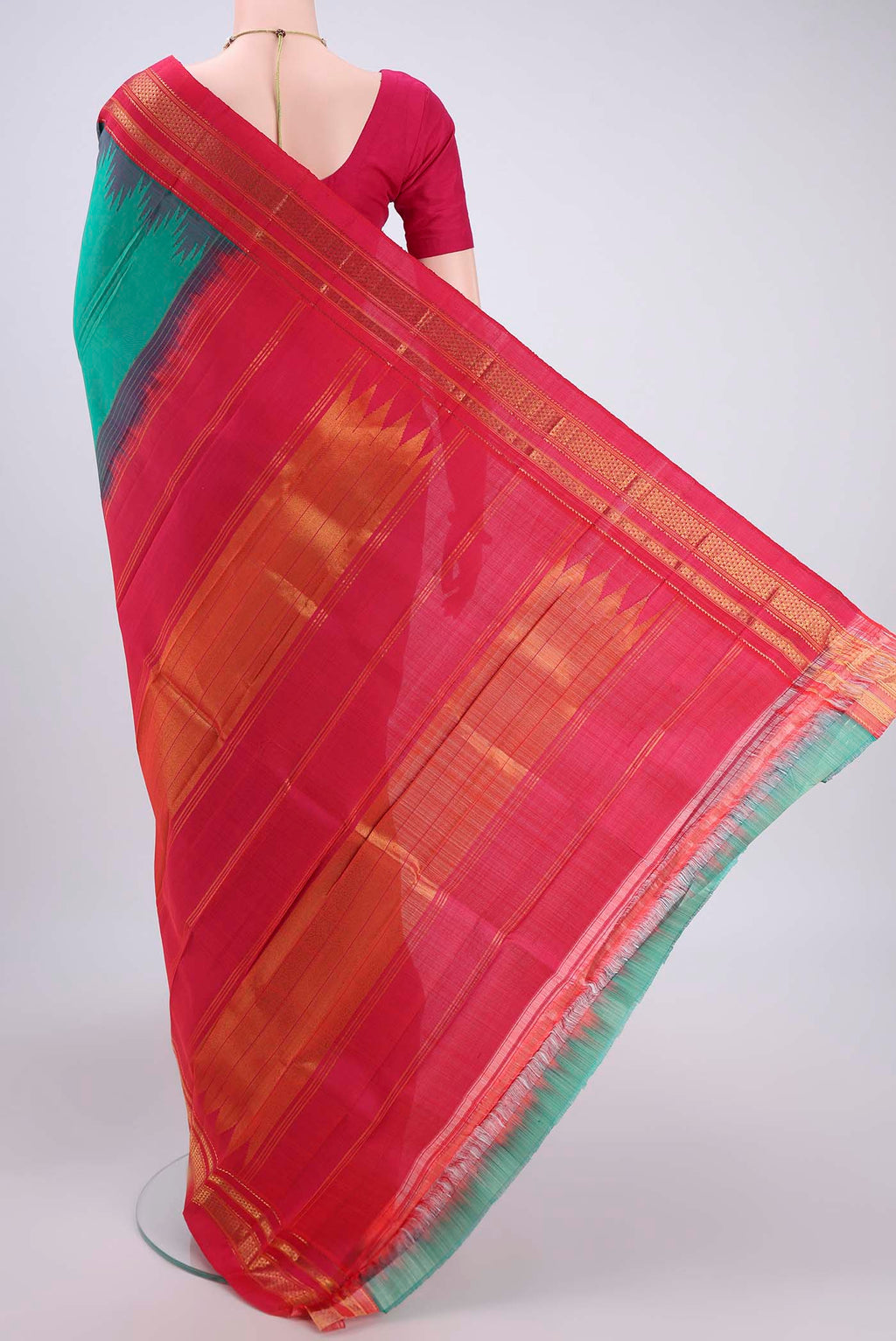 Flat view of Sea Green Bangalore Silk Saree with Plain Body and Temple Border. 
