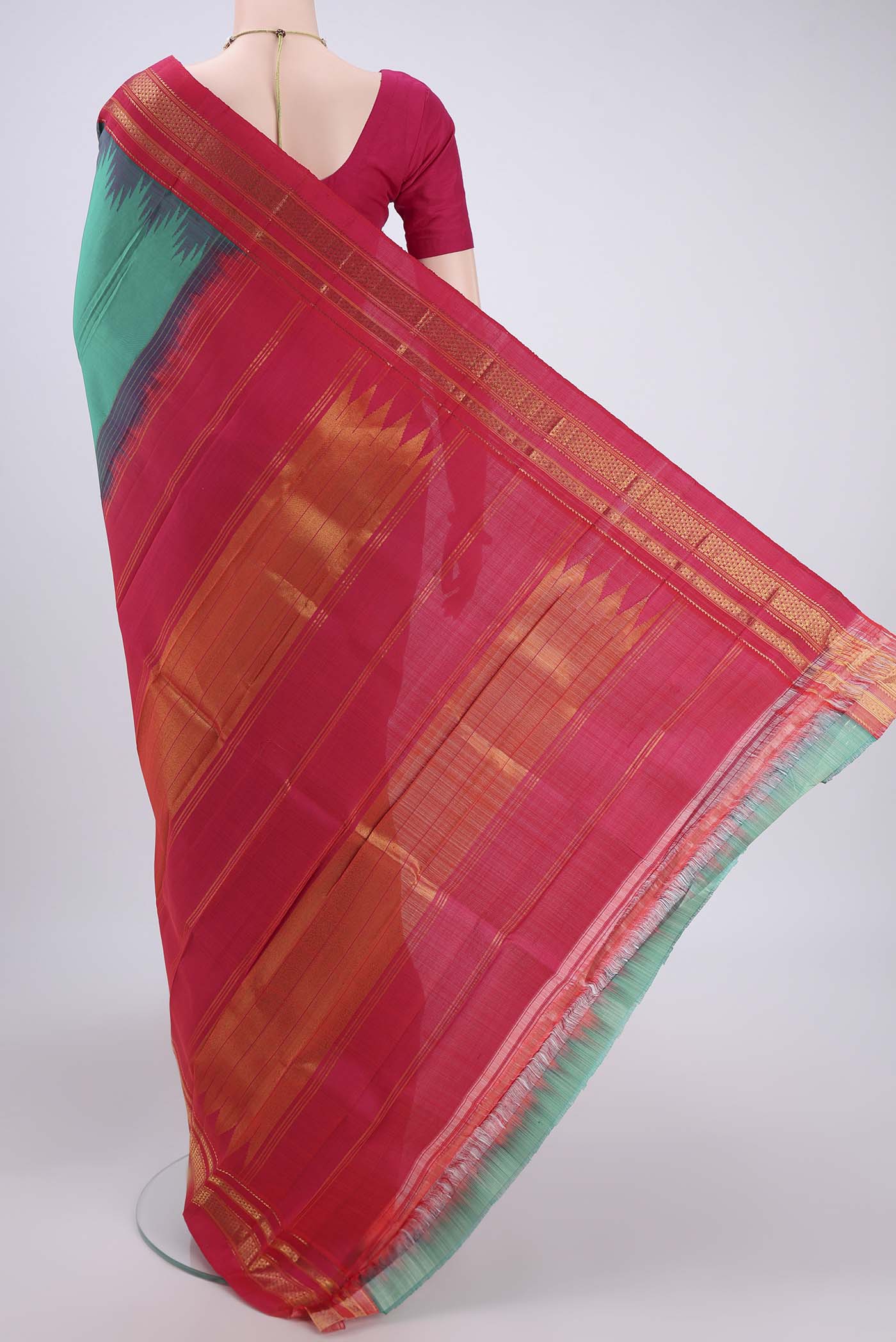 Flat view of Sea Green Bangalore Silk Saree with Plain Body and Temple Border. 
