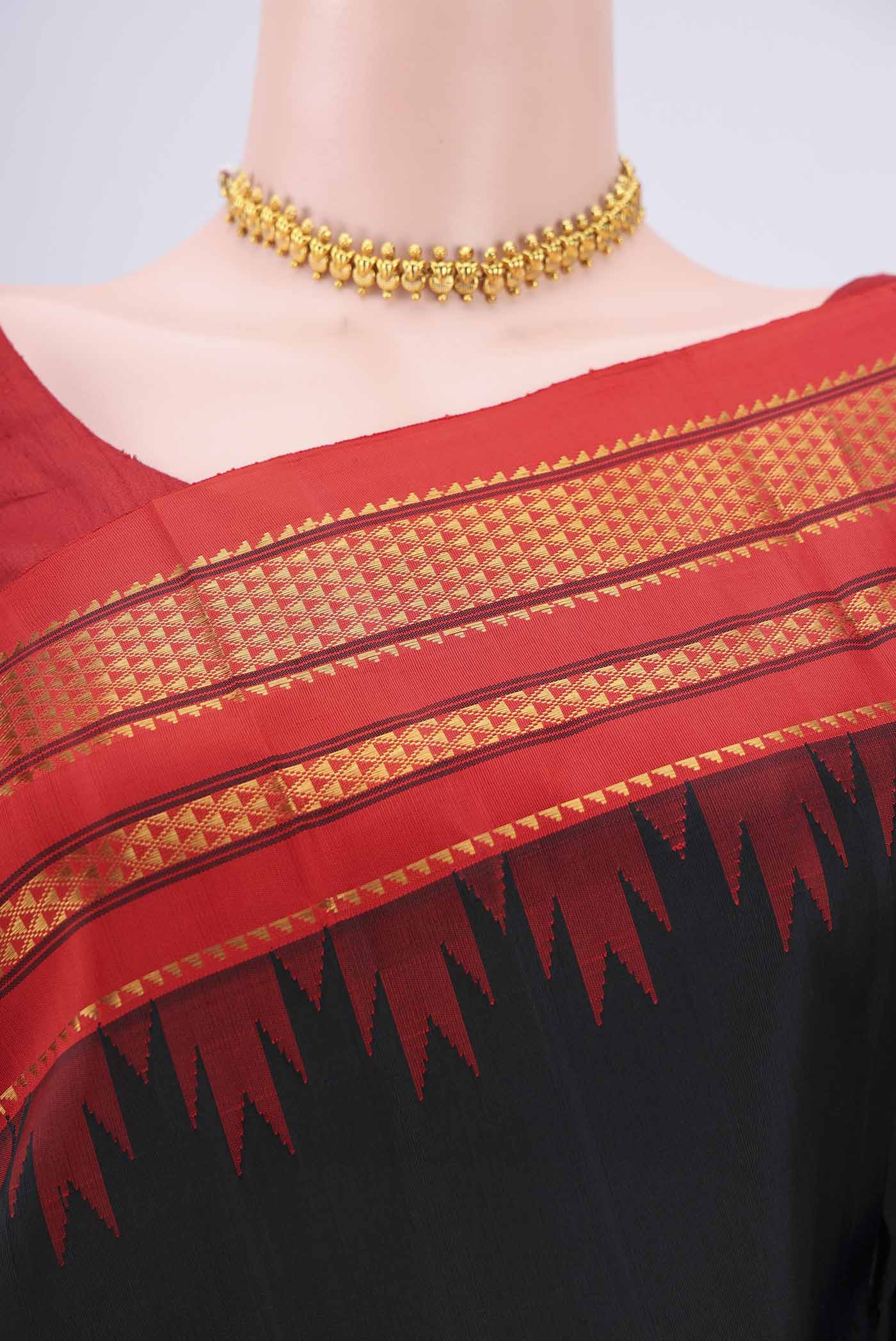Border image of Black Bangalore Silk Saree with Plain Body and Temple Border. 