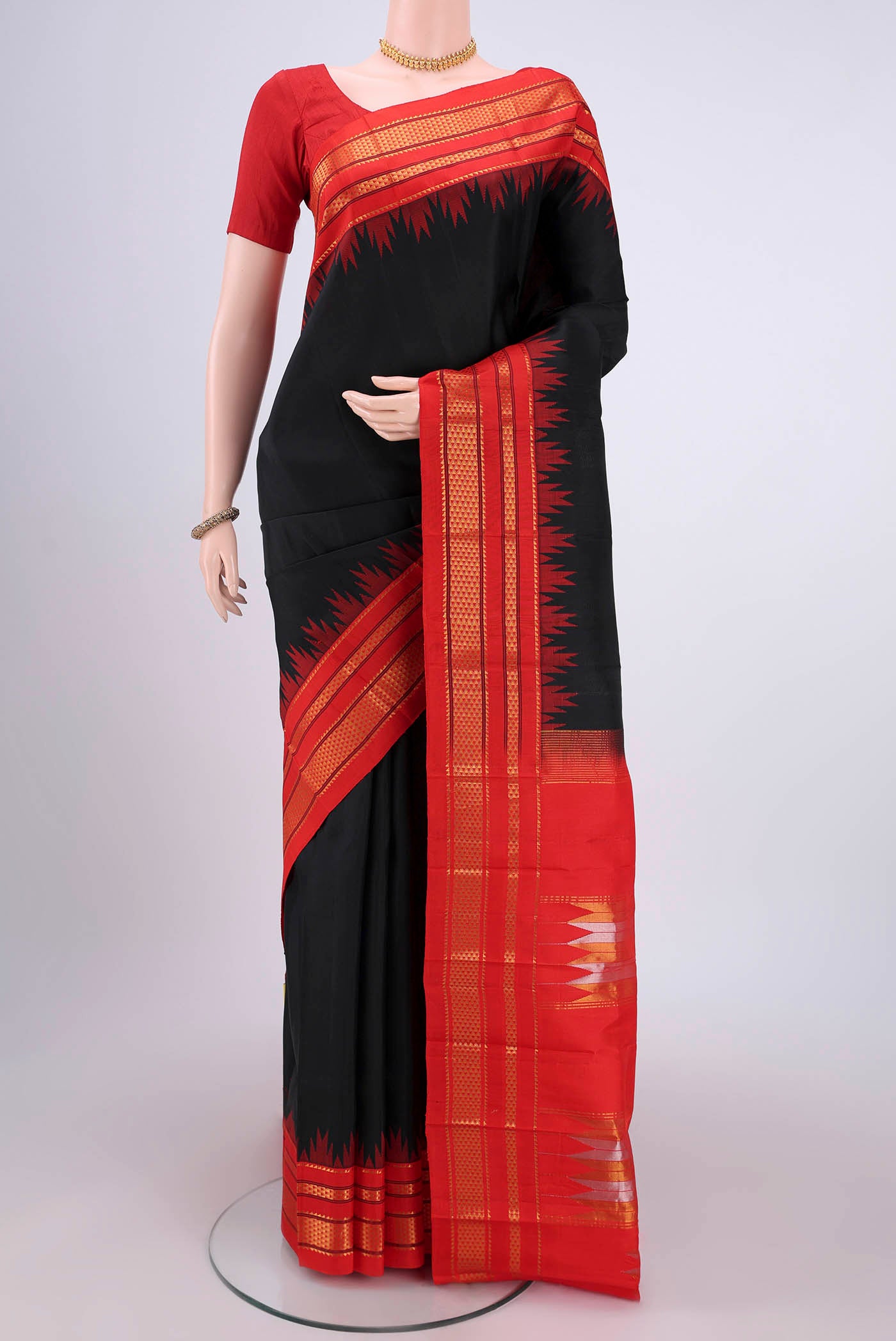 Black Bangalore Silk Saree with Plain Body and Temple Border.  displayed on a mannequin