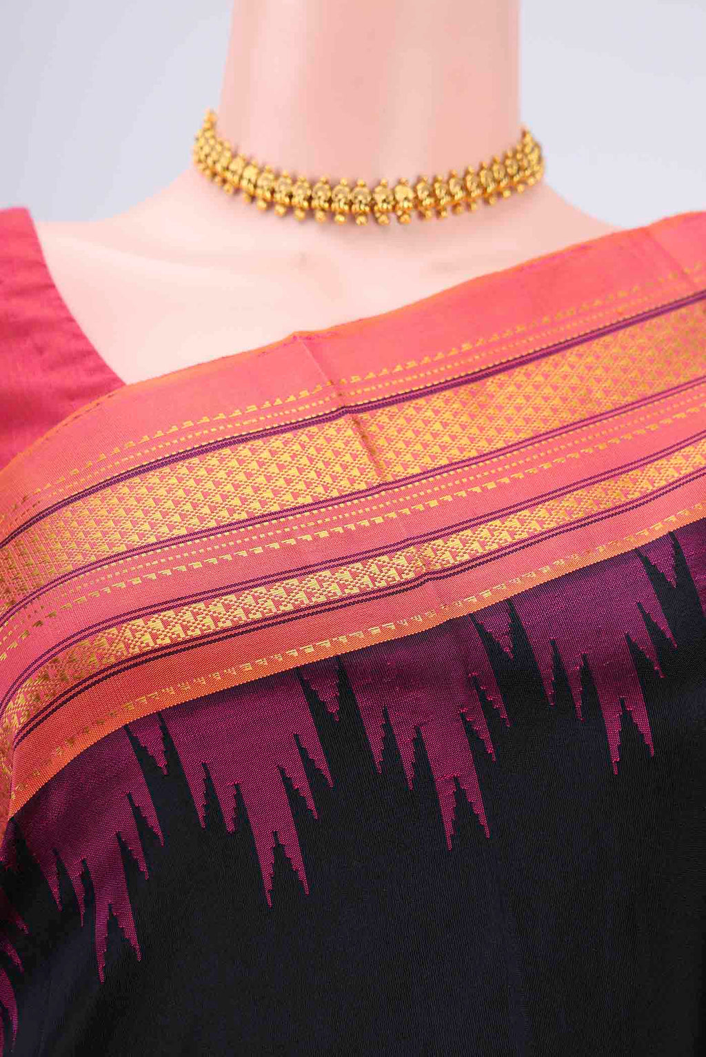 Border image of Black Bangalore Silk Saree with Plain Body and Temple Border. 